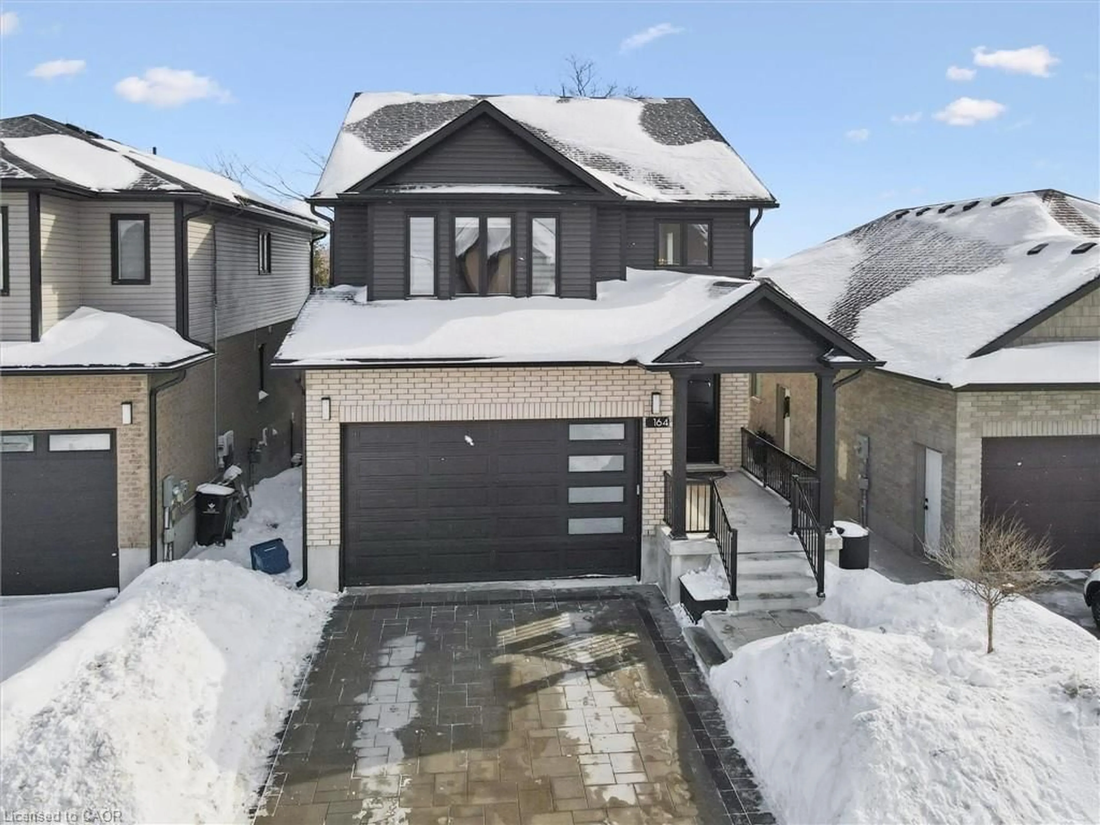 A pic from outside/outdoor area/front of a property/back of a property/a pic from drone, street for 164 Timber Trail Rd, Elmira Ontario N3B 0E3