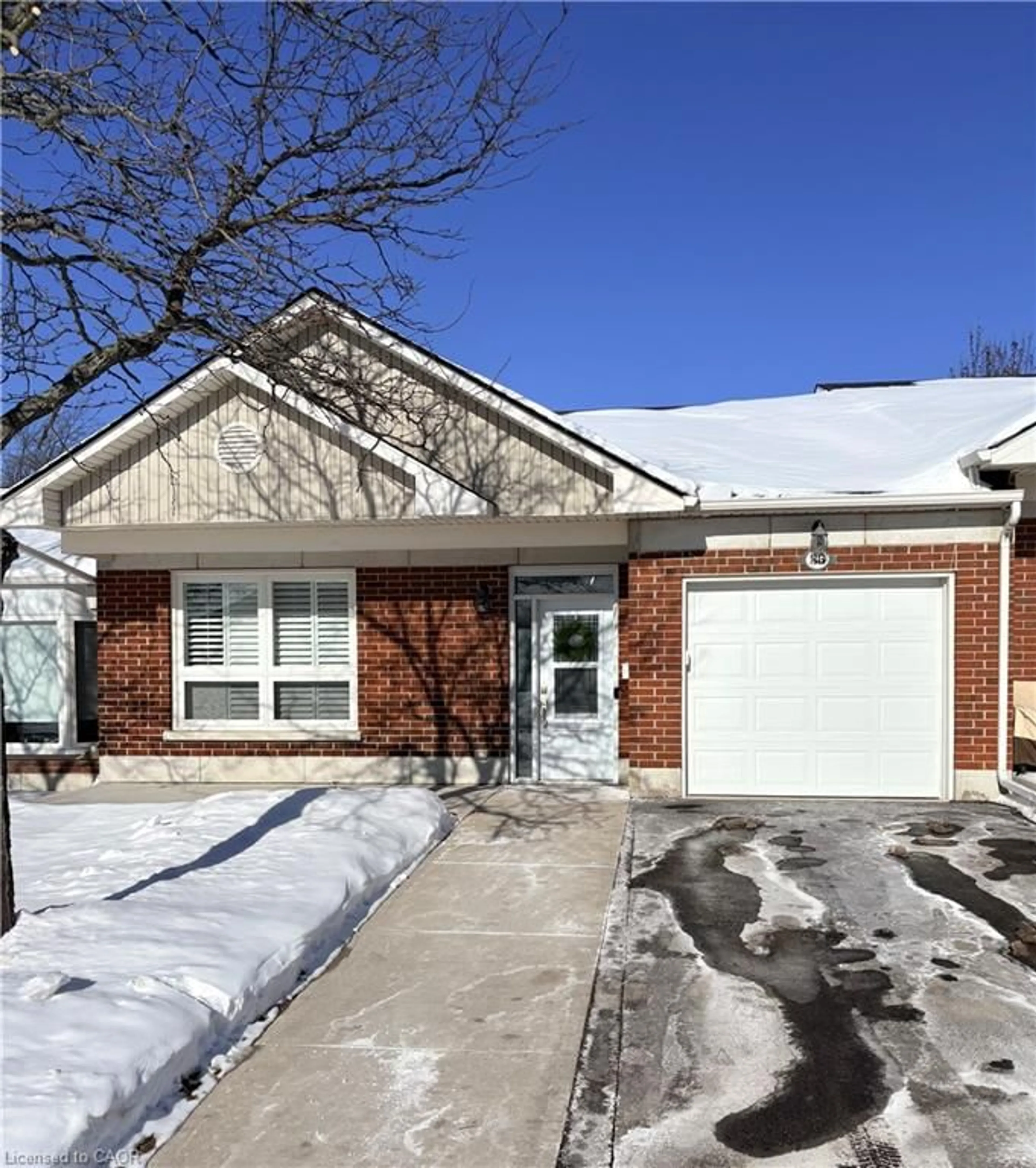 Home with brick exterior material, street for 36 Bishop Sherlock Lane, Hamilton Ontario L9B 2S5