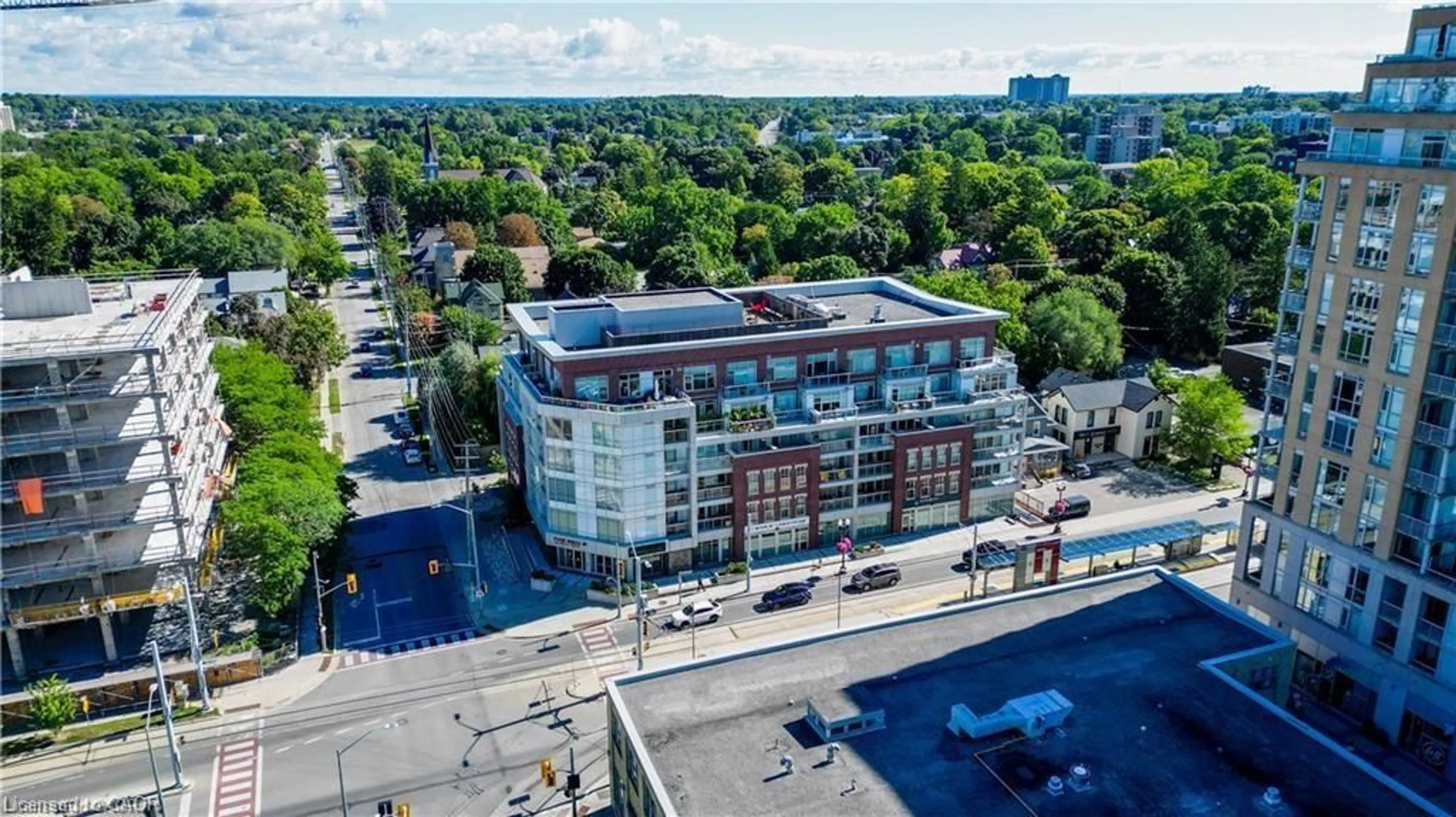 A pic from outside/outdoor area/front of a property/back of a property/a pic from drone, city buildings view from balcony for 188 King St #402, Waterloo Ontario N2J 0C6