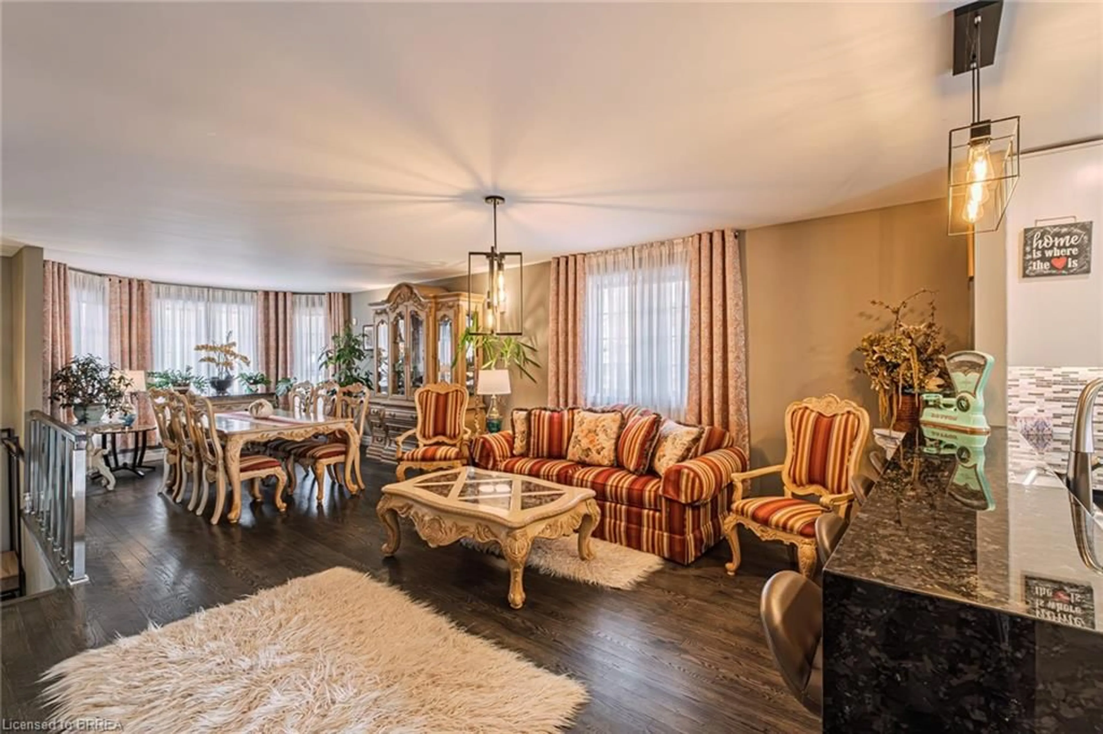 Living room with furniture, wood/laminate floor for 52 Amelia St, Paris Ontario N3L 1Z6