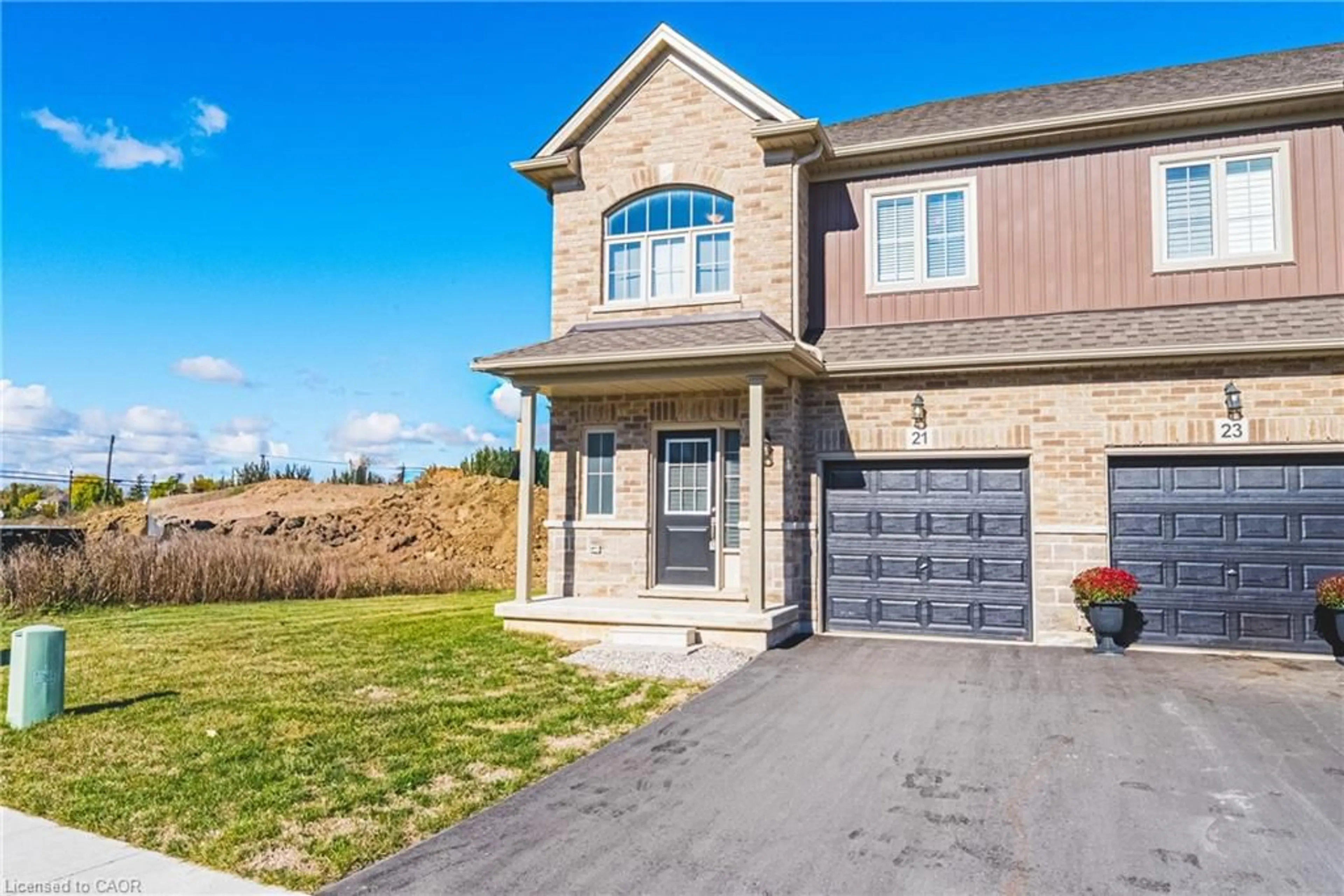 Home with brick exterior material, street for 21 Zoe Lane, Binbrook Ontario L0R 1C0
