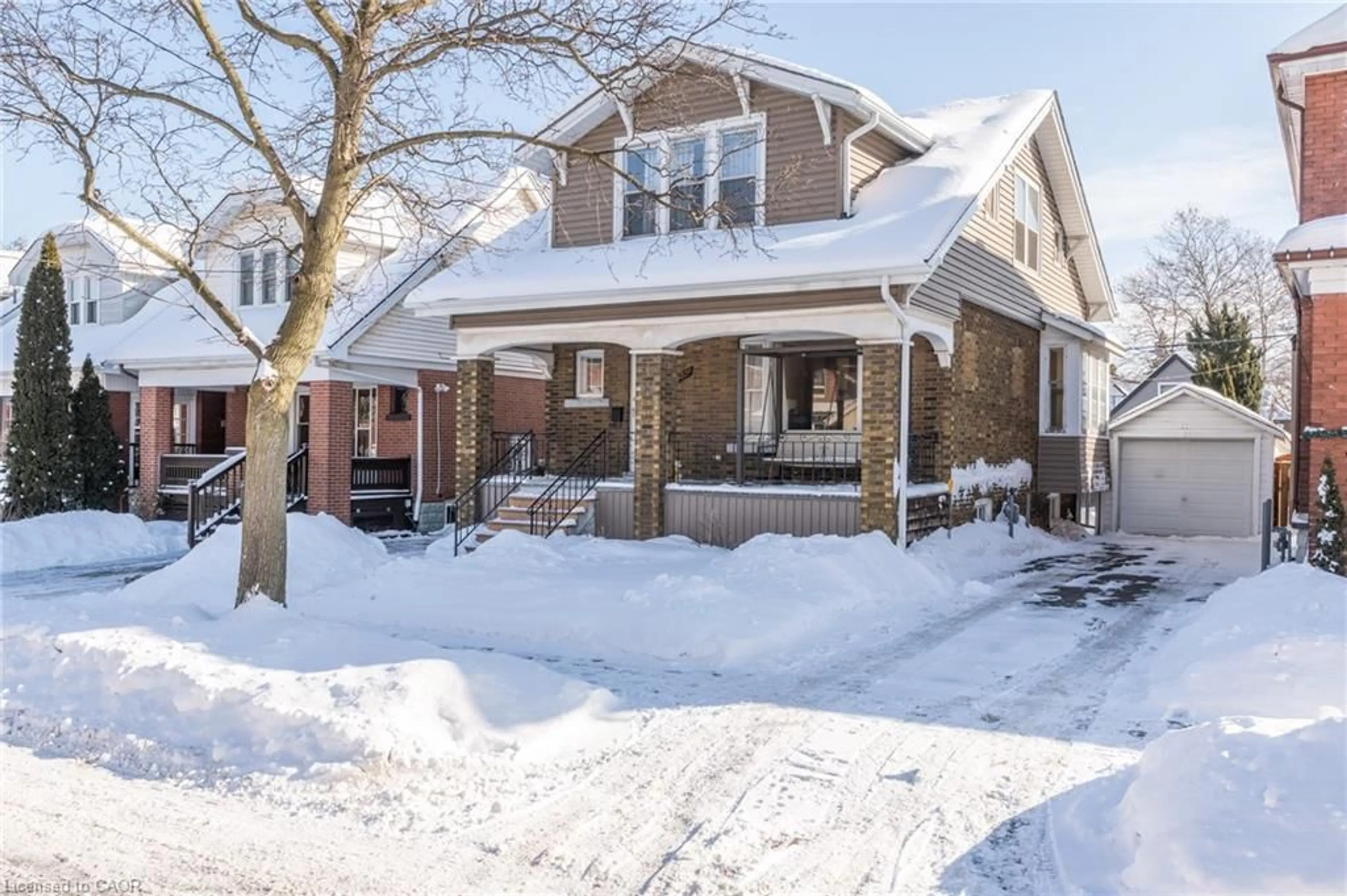 Home with brick exterior material, street for 229 Park Row, Hamilton Ontario L8K 2K4