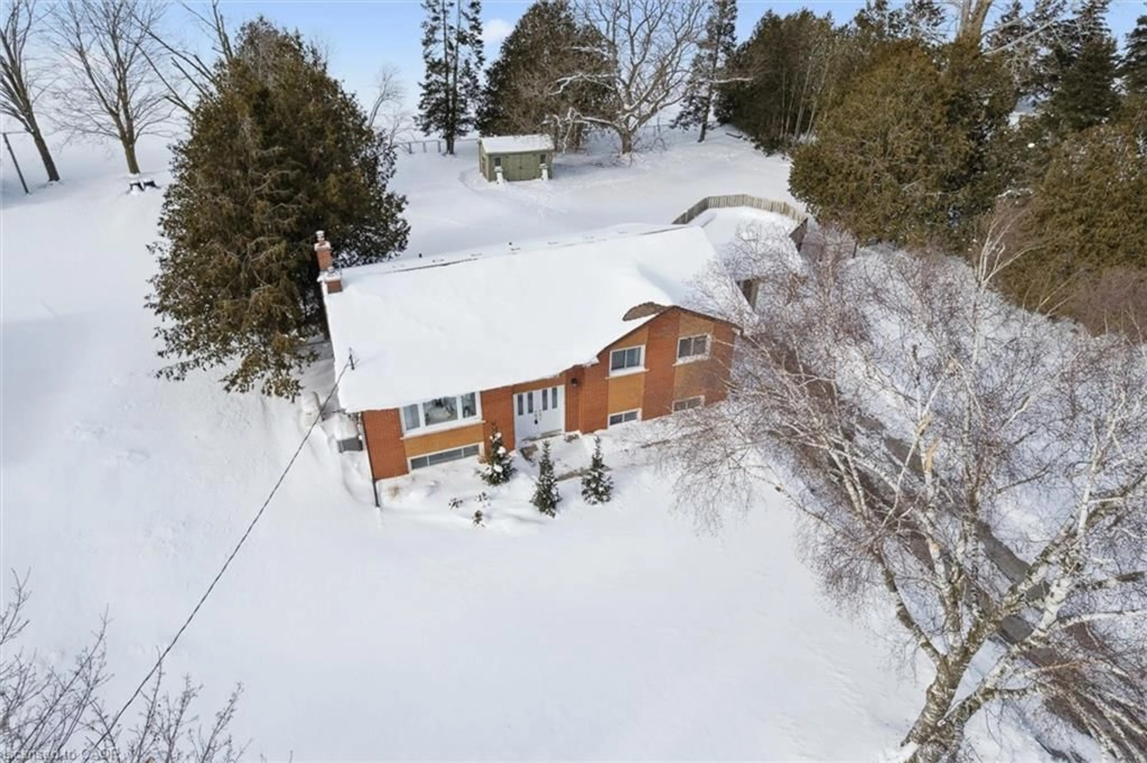 A pic from outside/outdoor area/front of a property/back of a property/a pic from drone, street for 7430 Wellington Rd 51, Ariss Ontario N0B 1B0