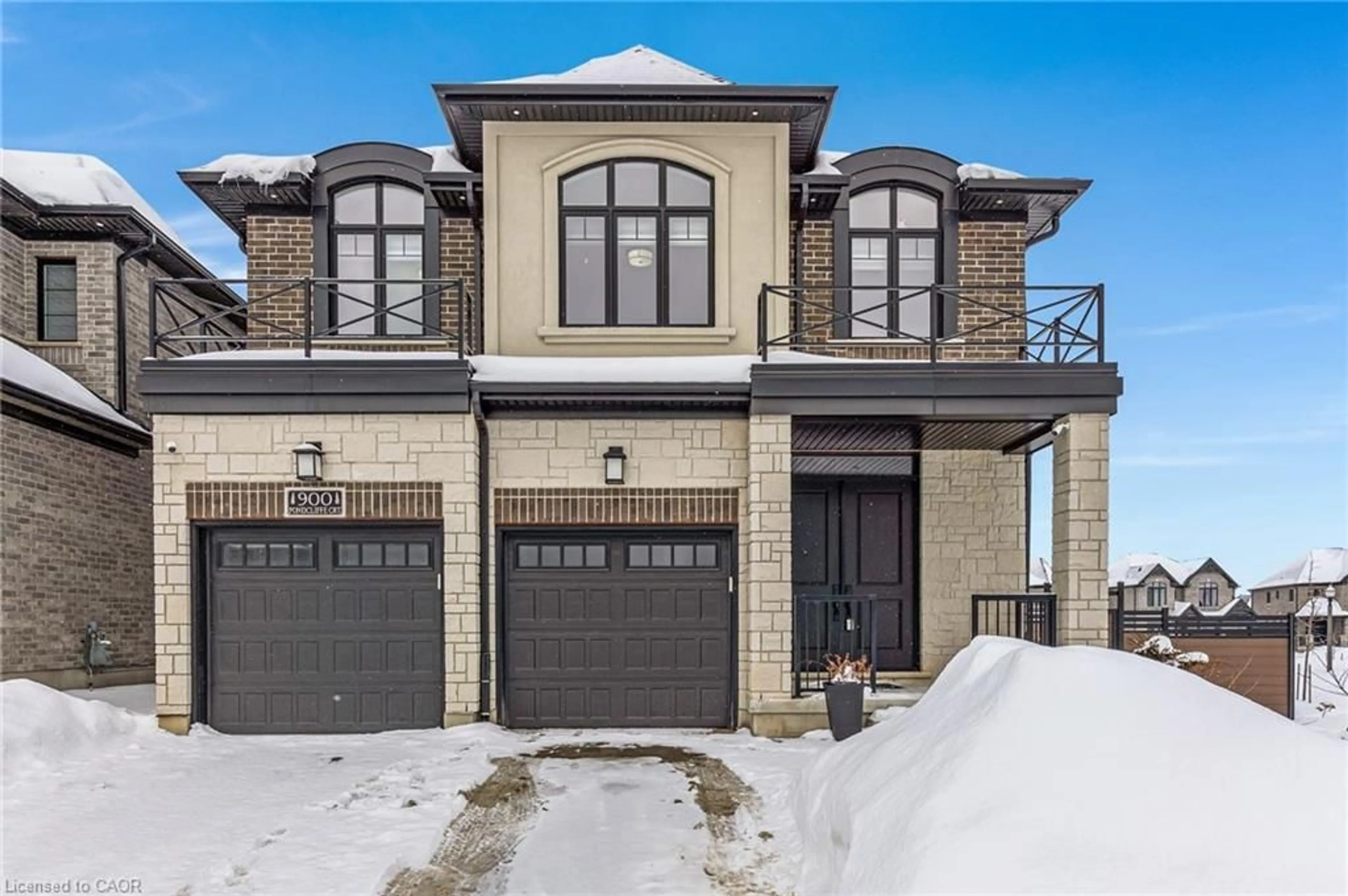 Home with brick exterior material, street for 900 Pondcliffe Dr, Kitchener Ontario N2R 0M4