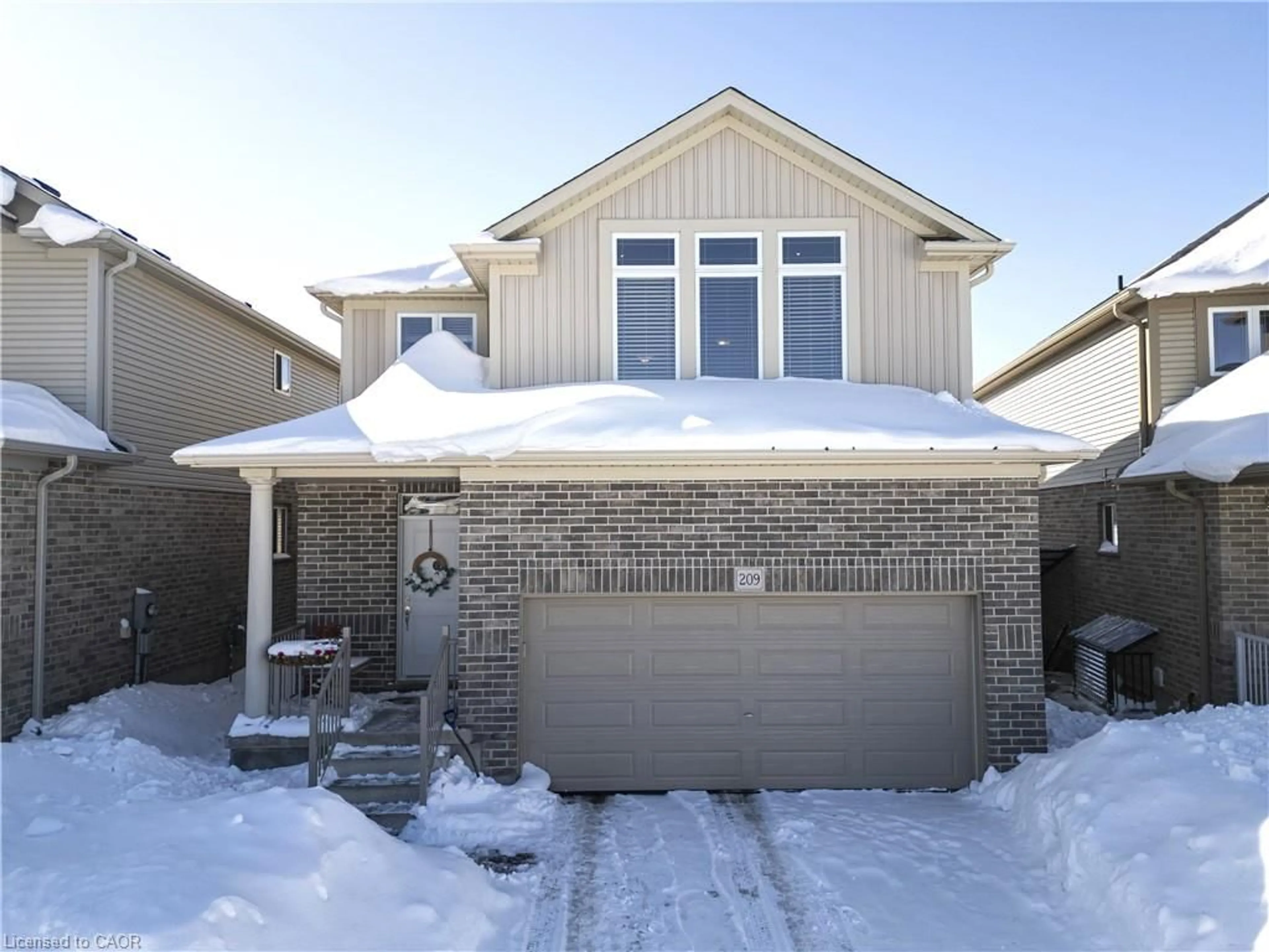 Home with brick exterior material, street for 209 Ladyslipper Dr, Waterloo Ontario N2V 0C3