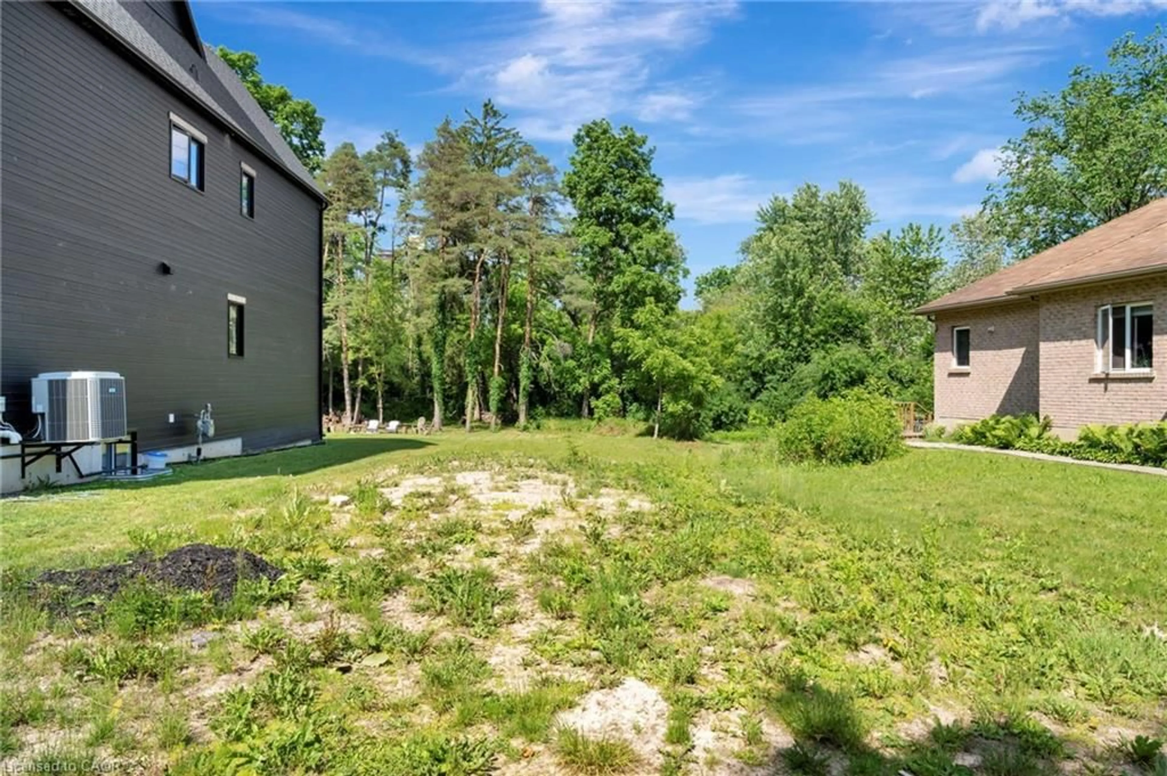 A pic from outside/outdoor area/front of a property/back of a property/a pic from drone, forest/trees view for 16 Mcdougall Rd, Waterloo Ontario N2L 2W5