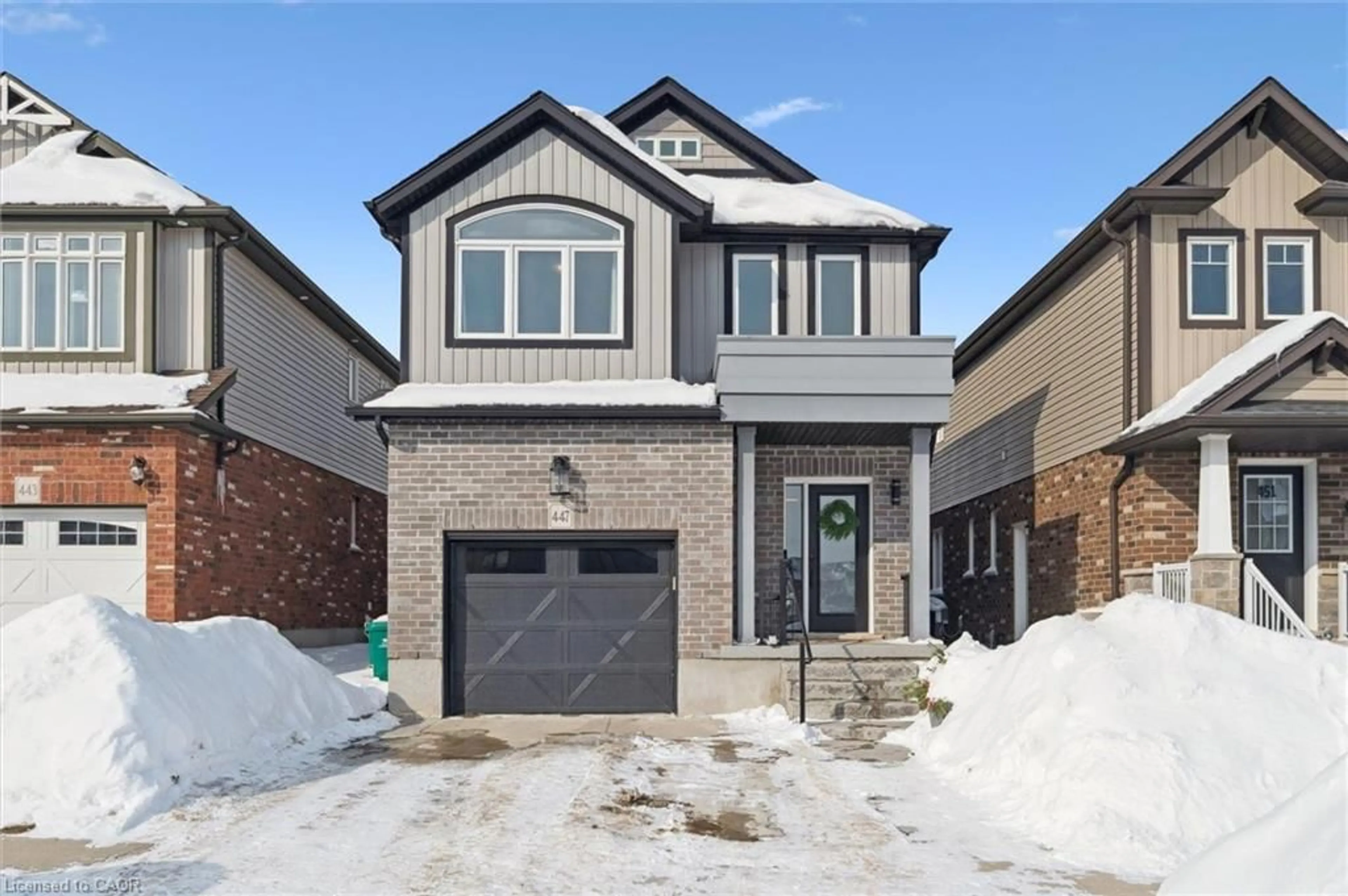 Home with brick exterior material, street for 447 Moorlands Cres, Kitchener Ontario N2P 0C9
