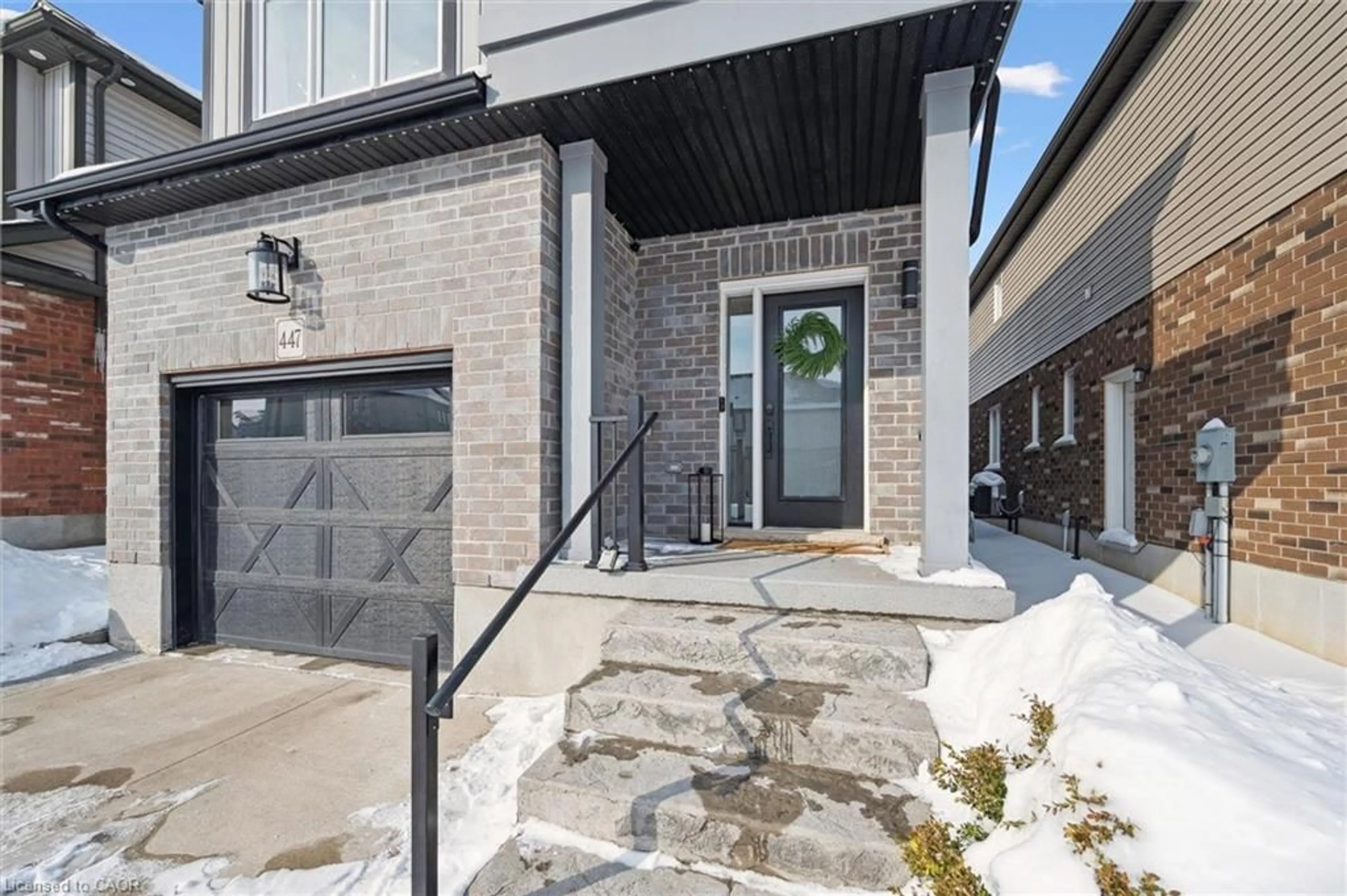Home with brick exterior material, street for 447 Moorlands Cres, Kitchener Ontario N2P 0C9