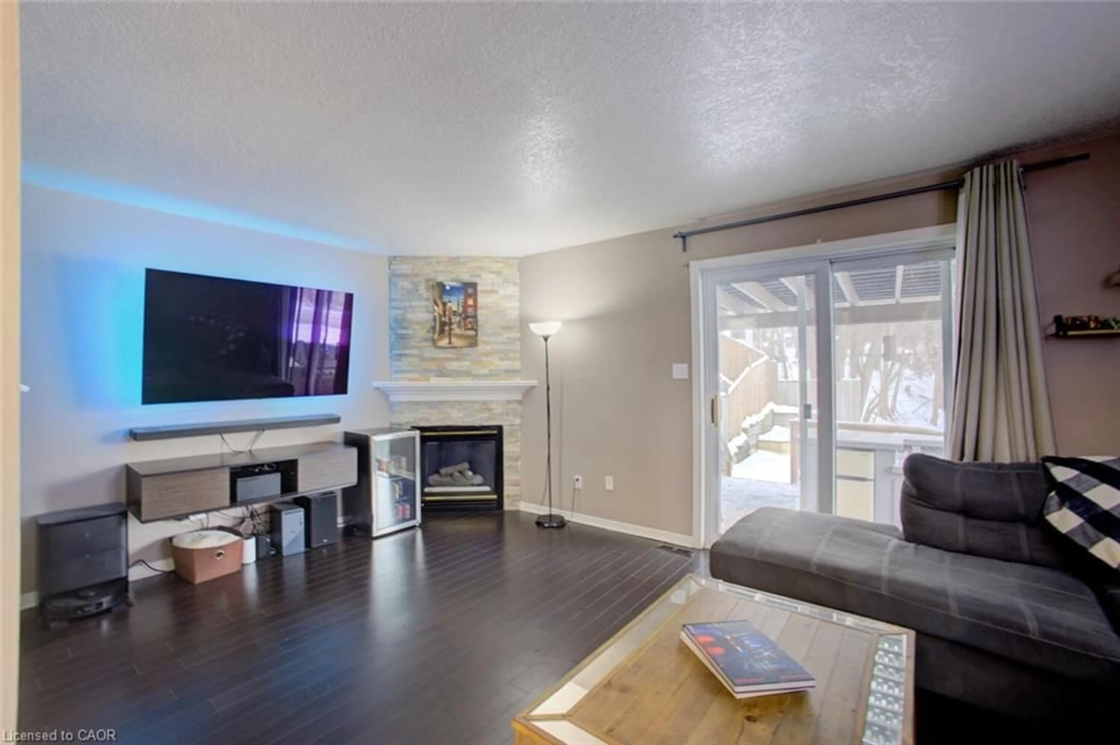 Living room with furniture, wood/laminate floor for 2 Winston Blvd, Cambridge Ontario N3C 1L4