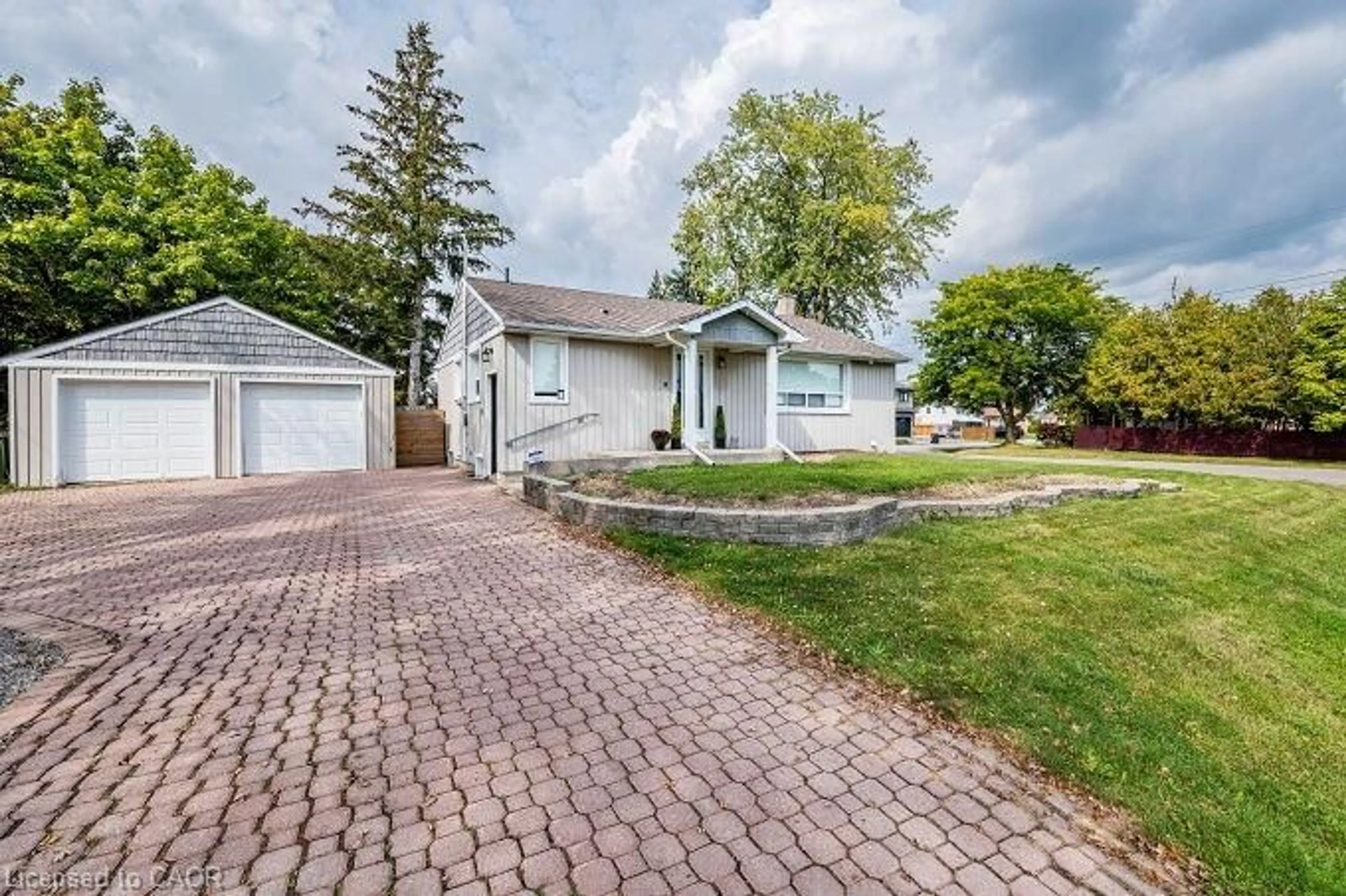 Home with vinyl exterior material, street for 107 Martha St, Peel Ontario L7E 4X5