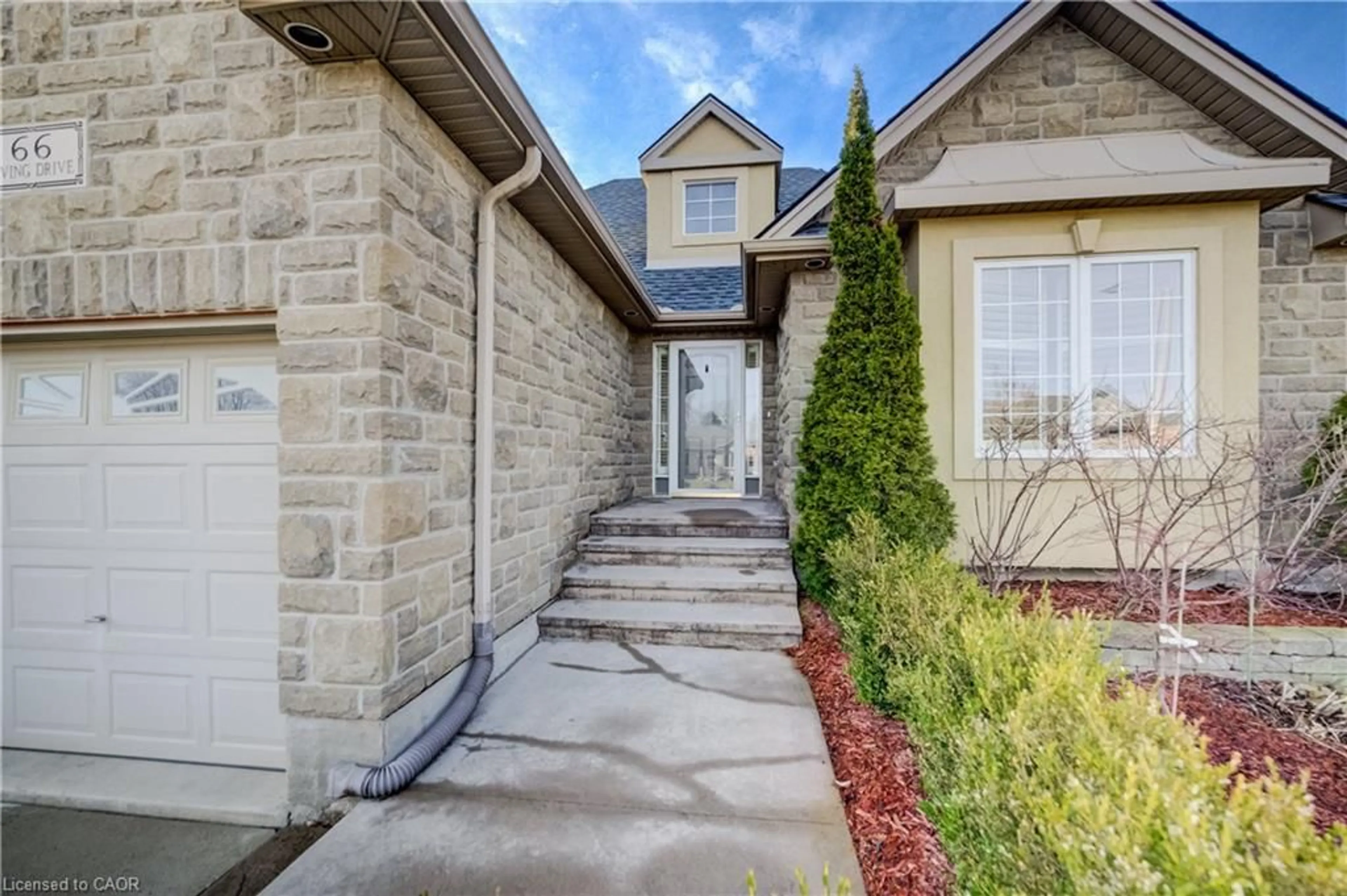 Home with brick exterior material, street for 66 Irving Dr, Norwich Ontario N0J 1P0