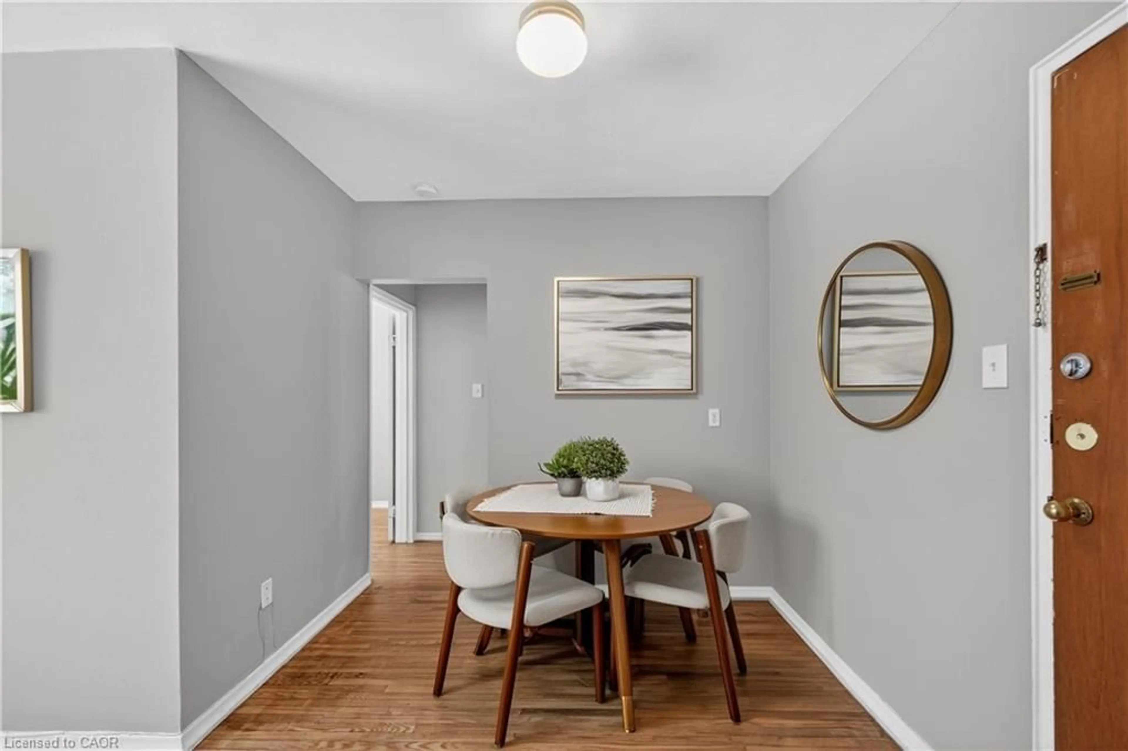 Dining room, wood/laminate floor for 37 Mericourt Rd #207, Hamilton Ontario L8S 2N5