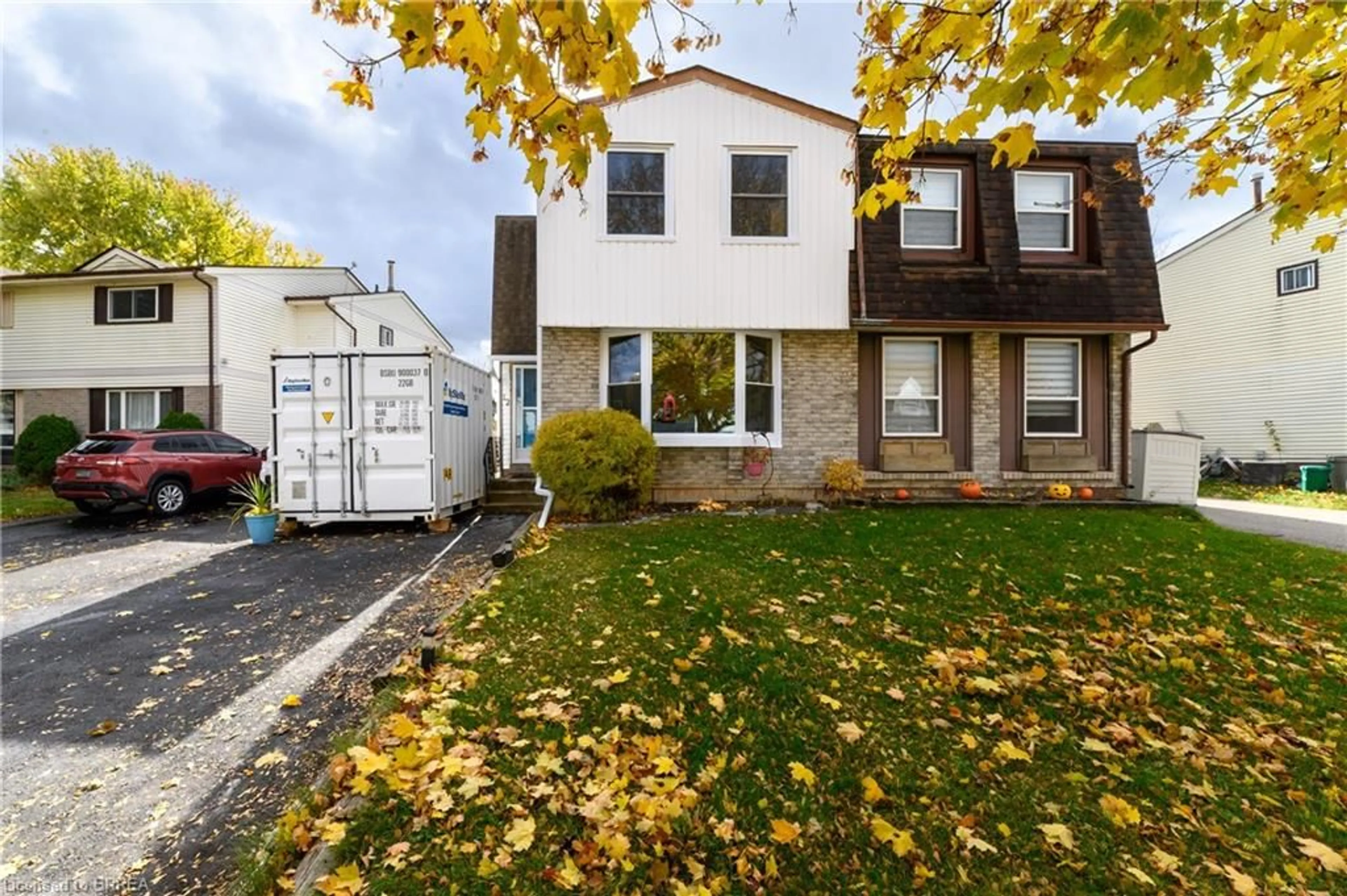 Home with vinyl exterior material, street for 12 White Owl Cres, Brantford Ontario N3P 1A2