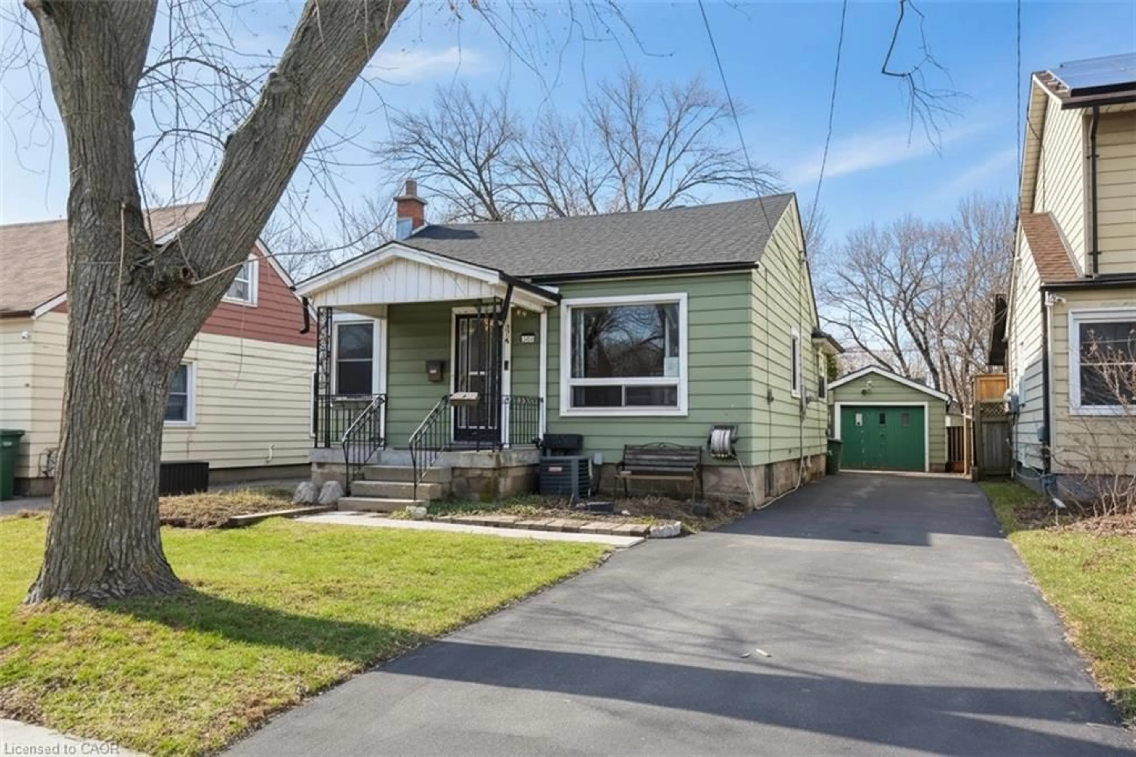 Home with vinyl exterior material, street for 376 Tragina Ave, Hamilton Ontario L8H 5E5