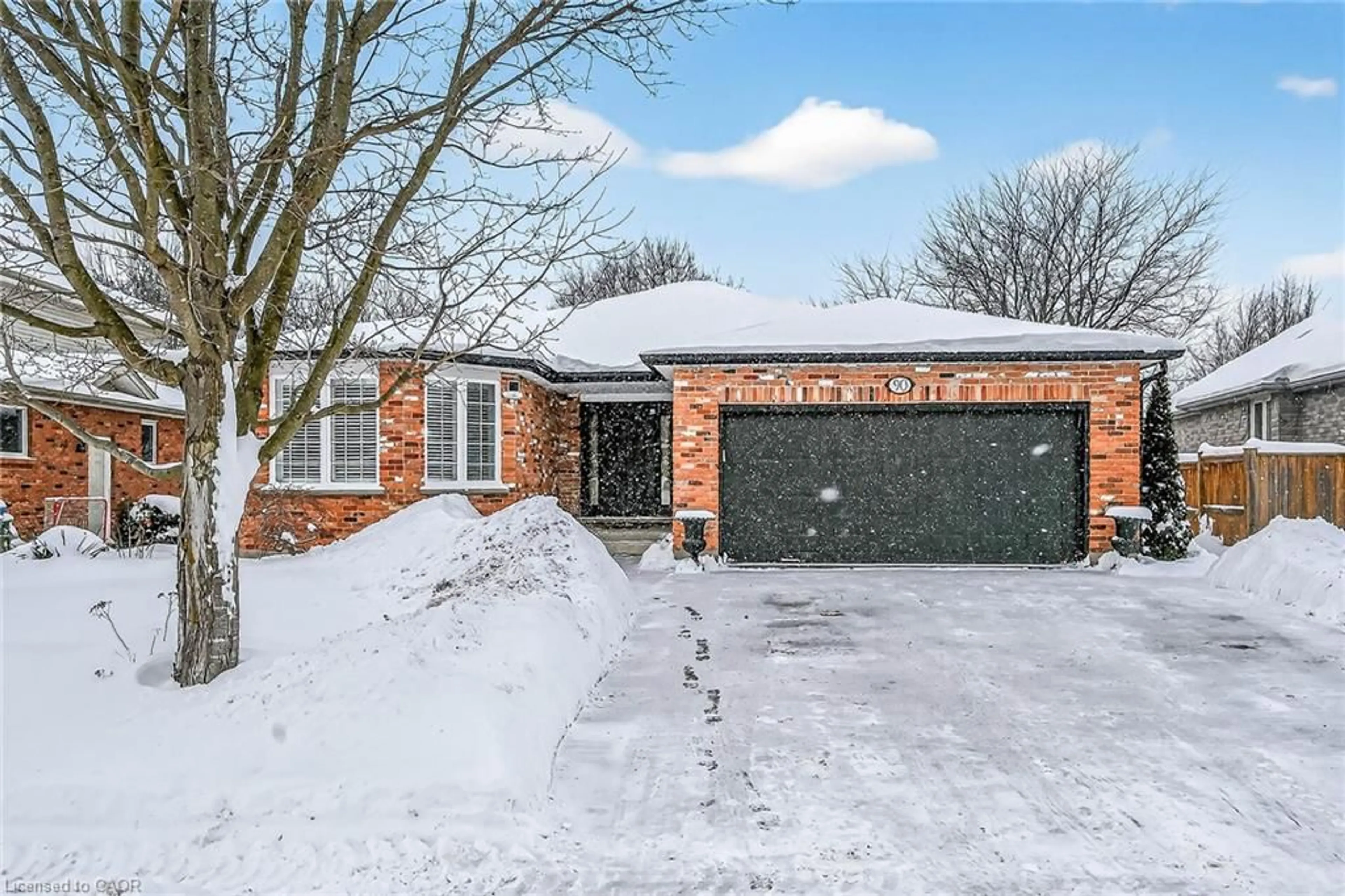 Home with brick exterior material, street for 90 Kortright Rd, Guelph Ontario N1G 4N8