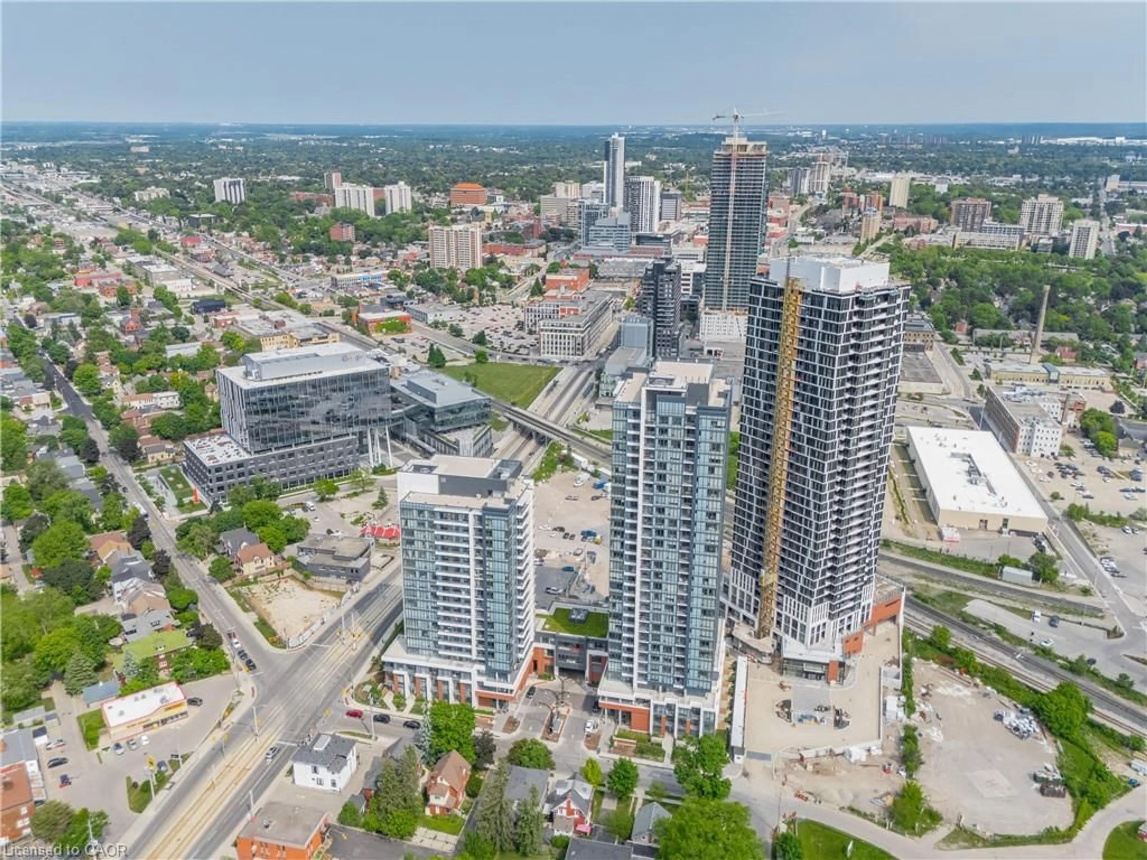 A pic from outside/outdoor area/front of a property/back of a property/a pic from drone, city buildings view from balcony for 15 Wellington St #318, Kitchener Ontario N2G 0E4