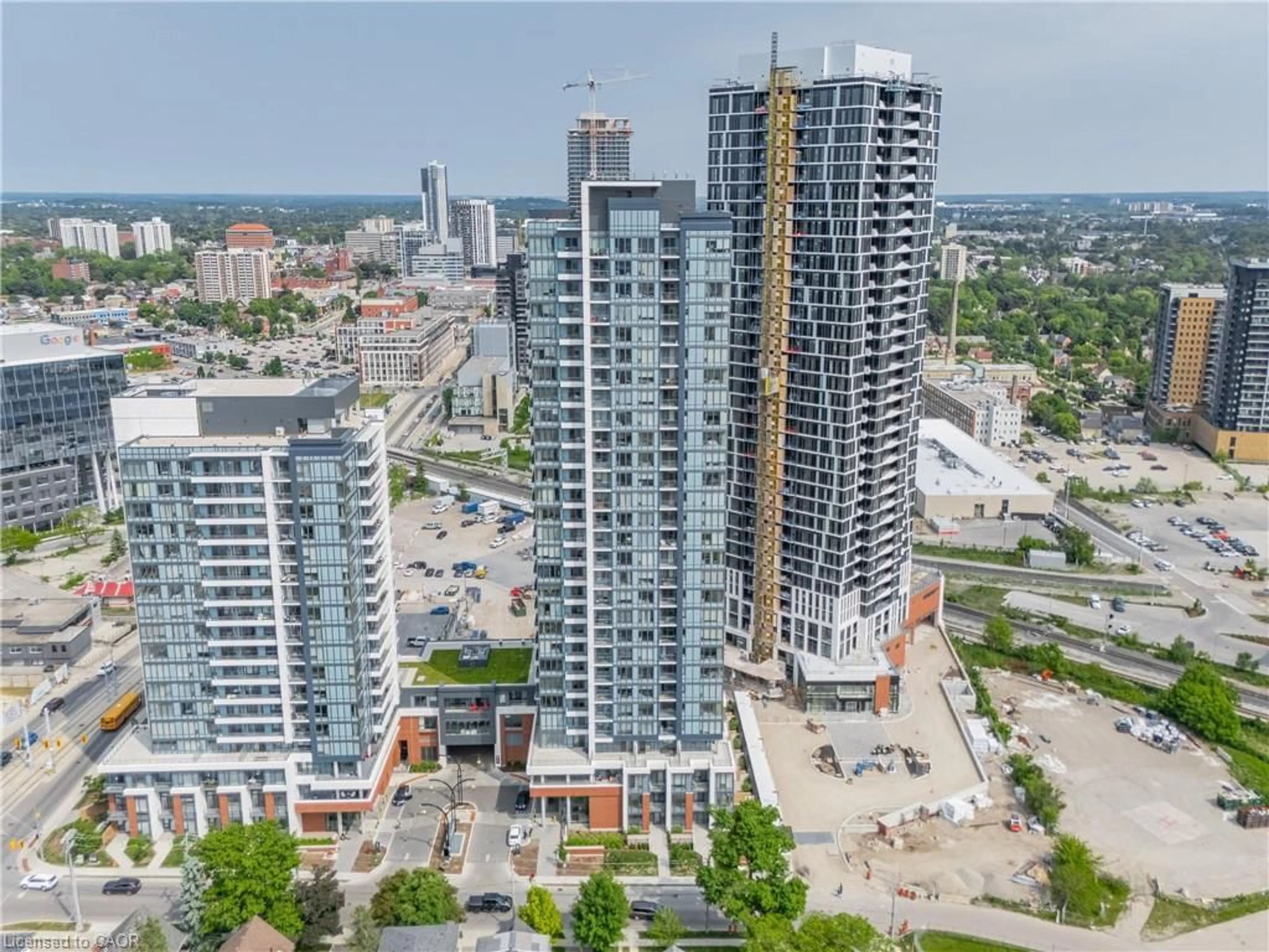 A pic from outside/outdoor area/front of a property/back of a property/a pic from drone, city buildings view from balcony for 15 Wellington St #318, Kitchener Ontario N2G 0E4