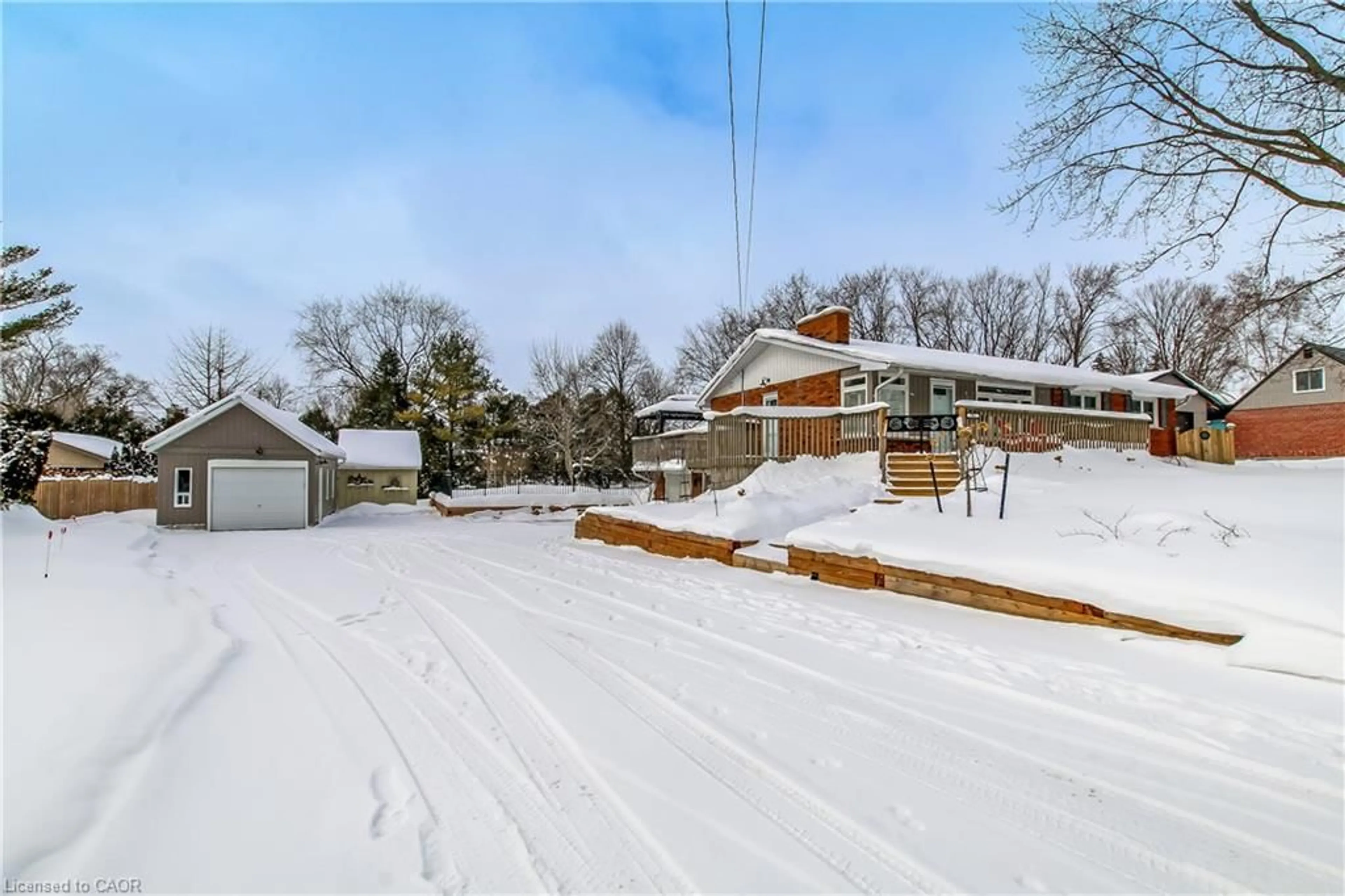 A pic from outside/outdoor area/front of a property/back of a property/a pic from drone, street for 702 Queen St, Innerkip Ontario N0J 1M0