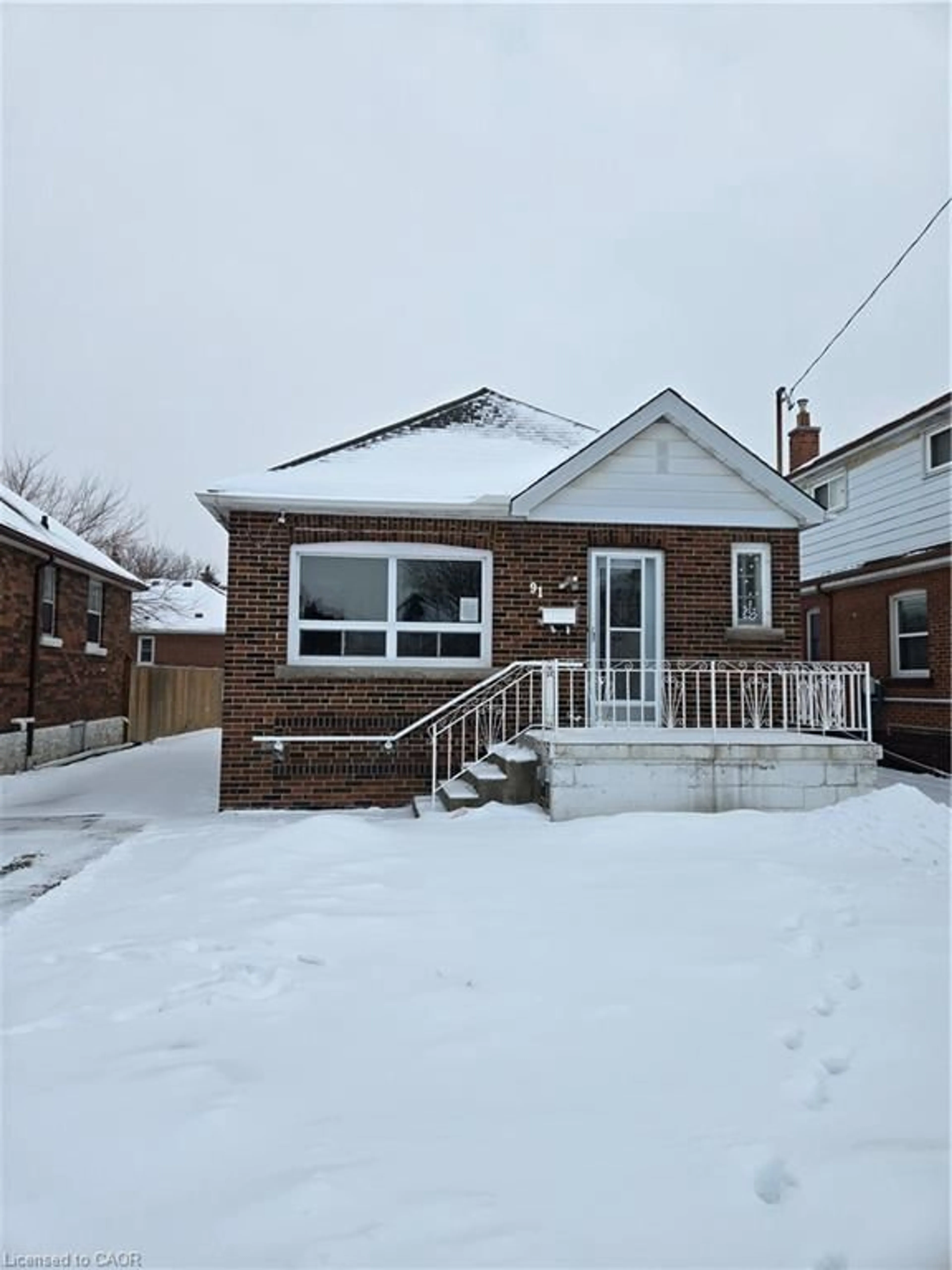Home with brick exterior material, street for 91 Barons Ave, Hamilton Ontario L8K 2Y5