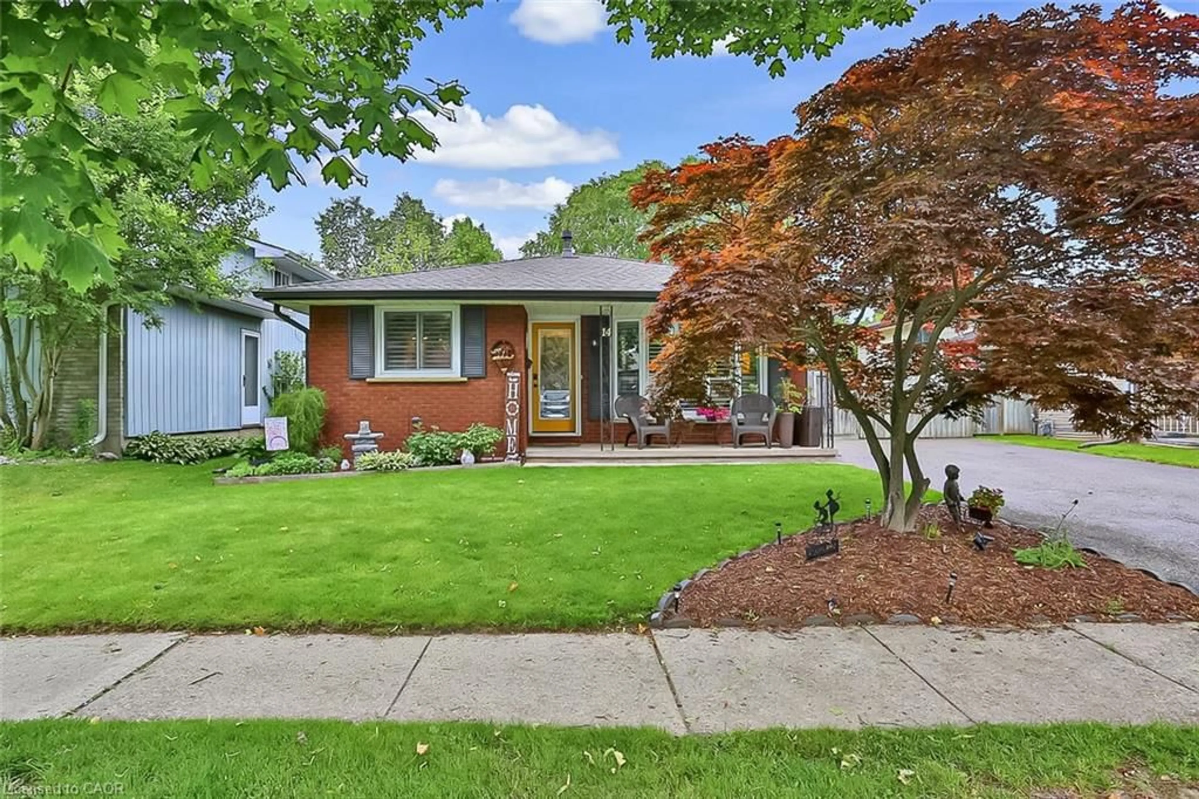 Home with brick exterior material, street for 14 Waxwing Way, Brantford Ontario N3R 6G1