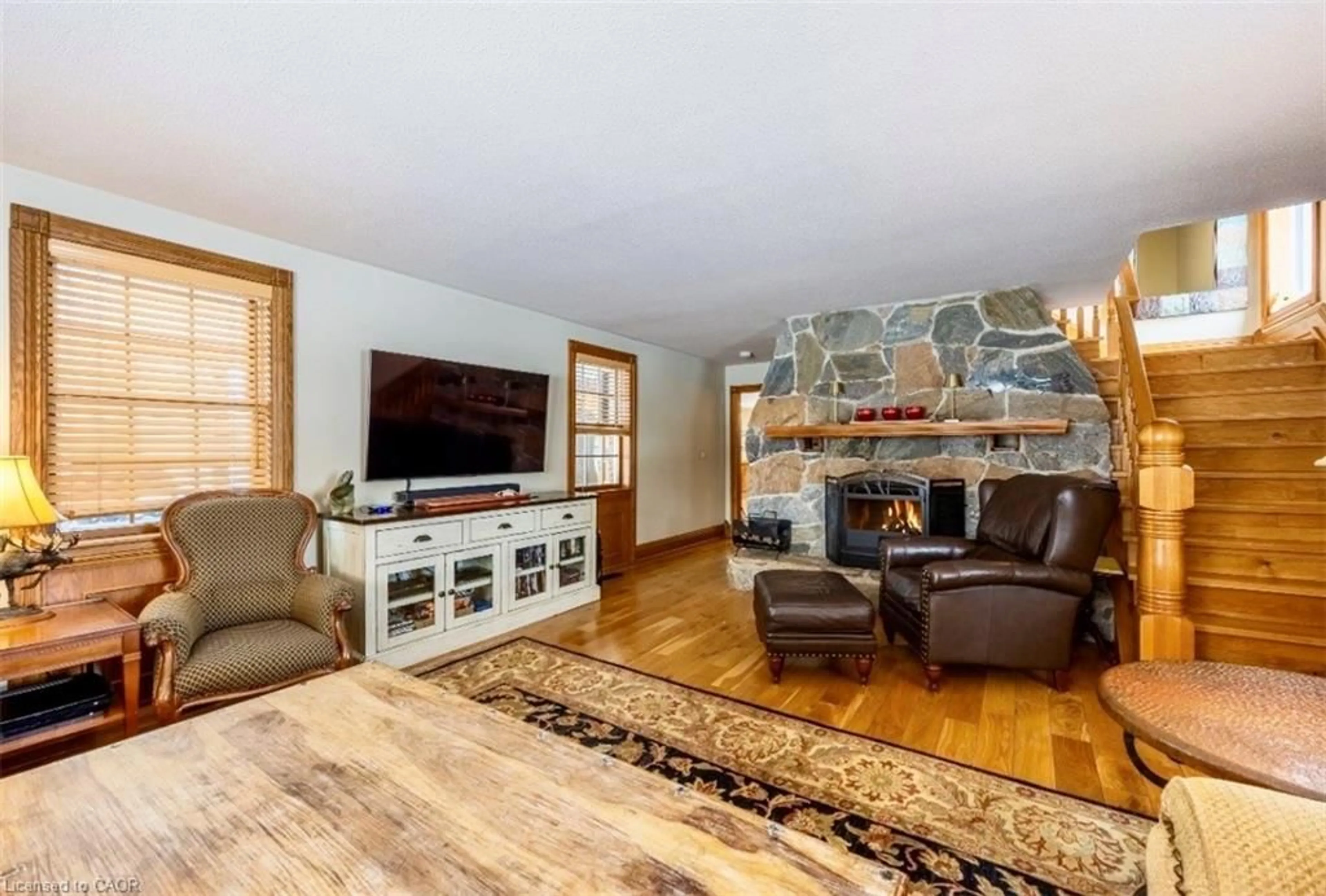 Living room with furniture, wood/laminate floor for 1568 Highway 59, Port Rowan Ontario N0E 1M0