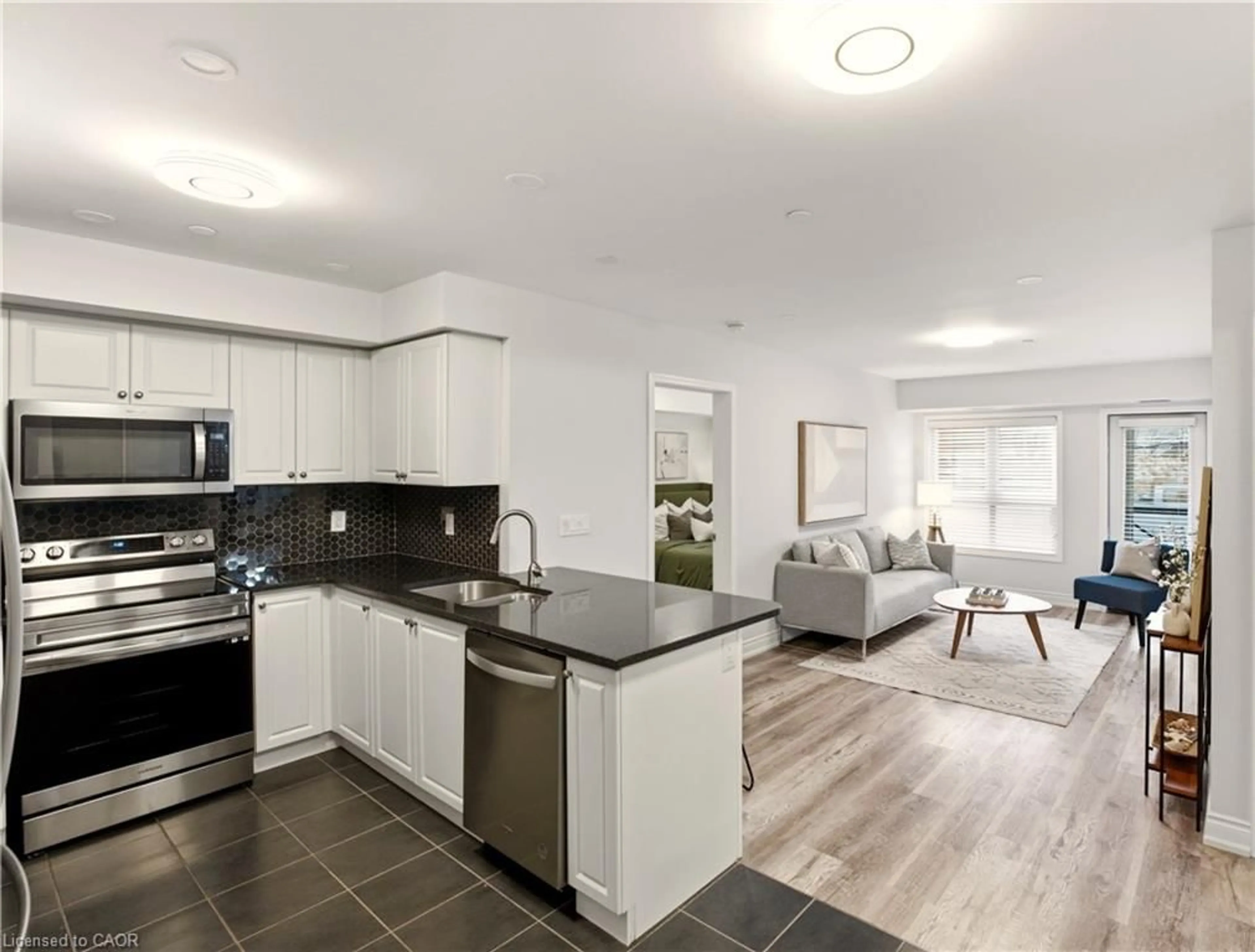 Open concept kitchen, ceramic/tile floor for 1045 Nadalin Hts #108, Milton Ontario L9T 8R5