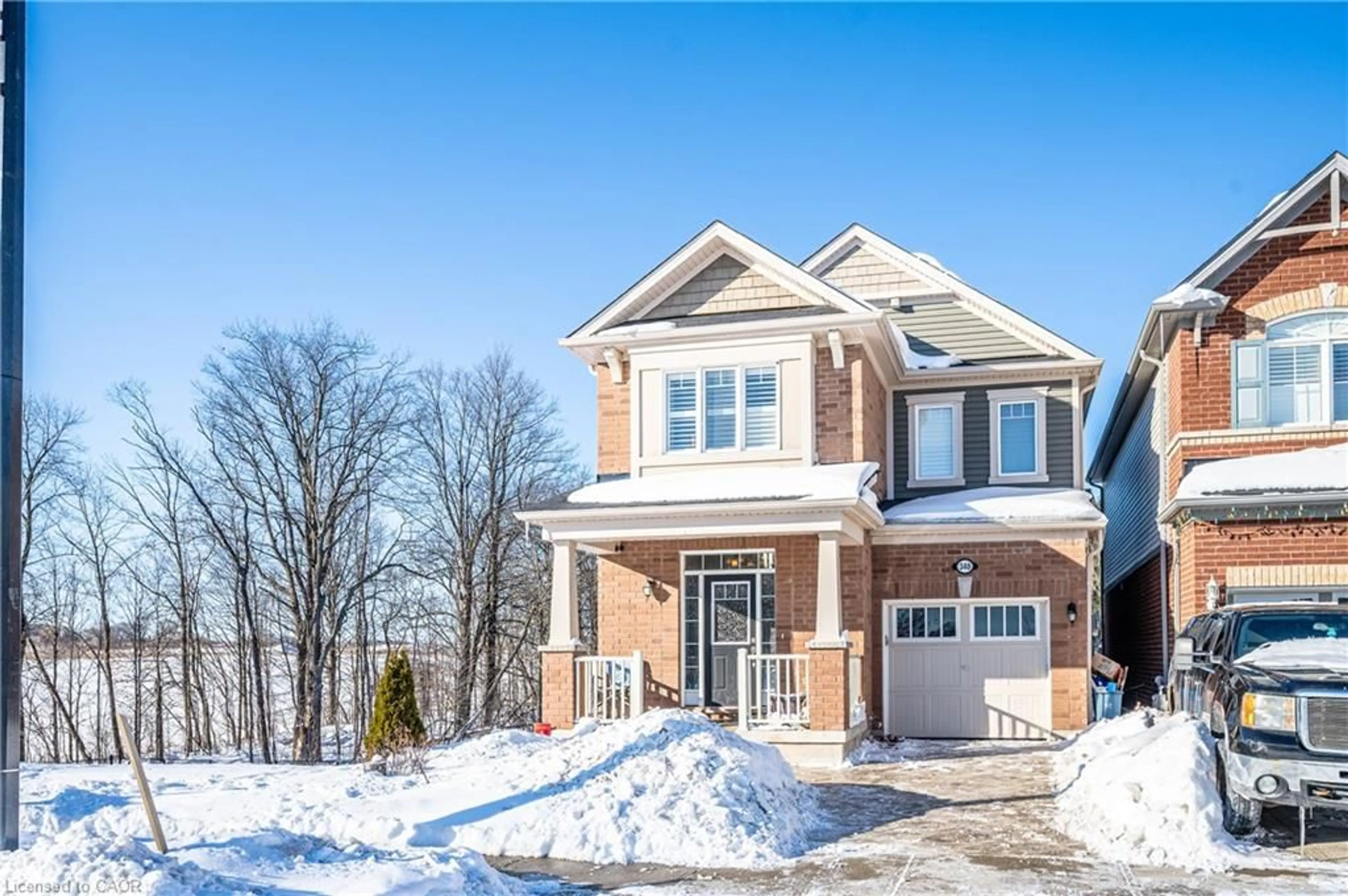 Home with brick exterior material, street for 340 Shady Glen Cres, Kitchener Ontario N2R 0J8