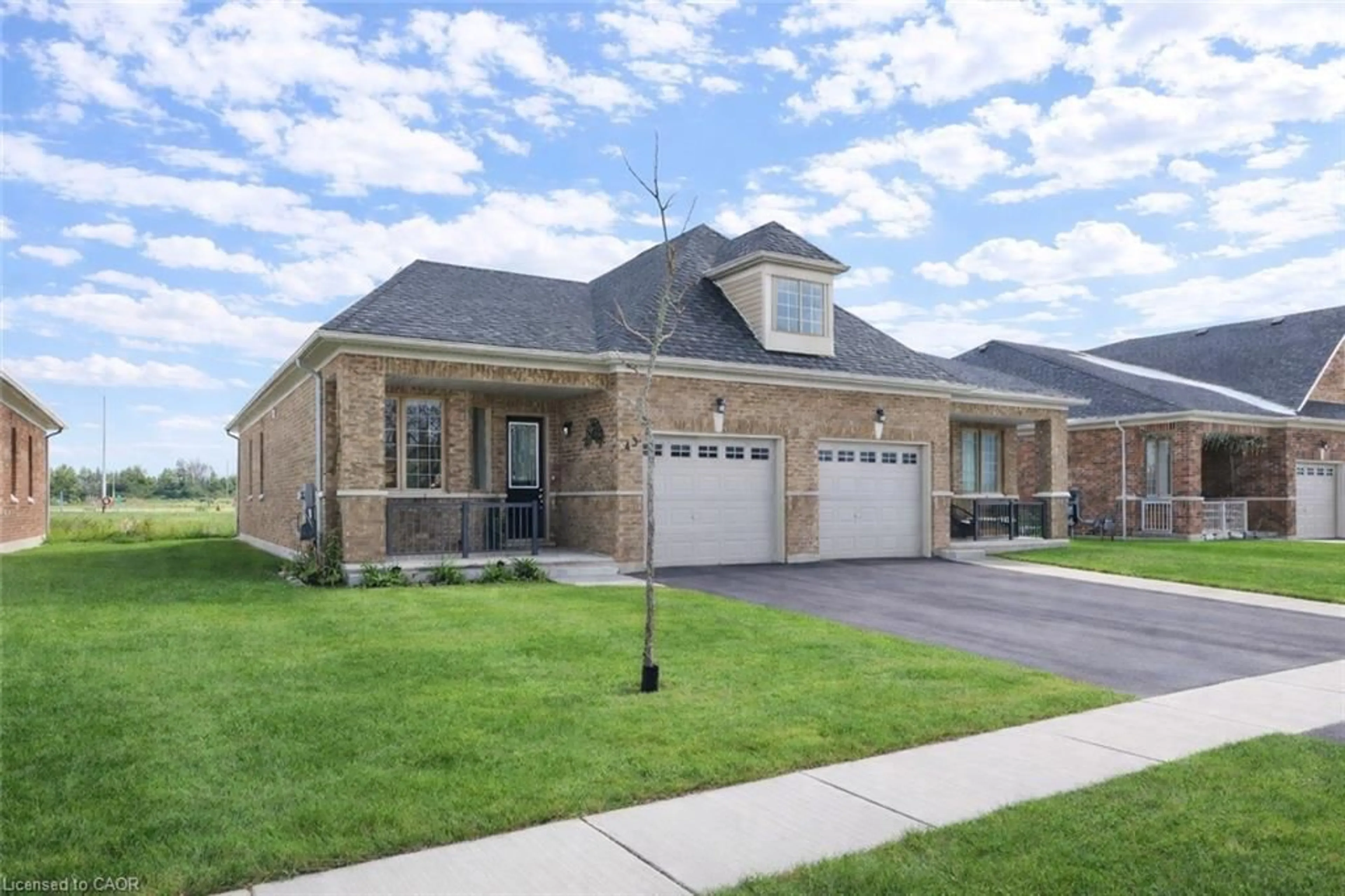 Home with brick exterior material, street for 43 Harvest Ave, Tillsonburg Ontario N4G 0H9