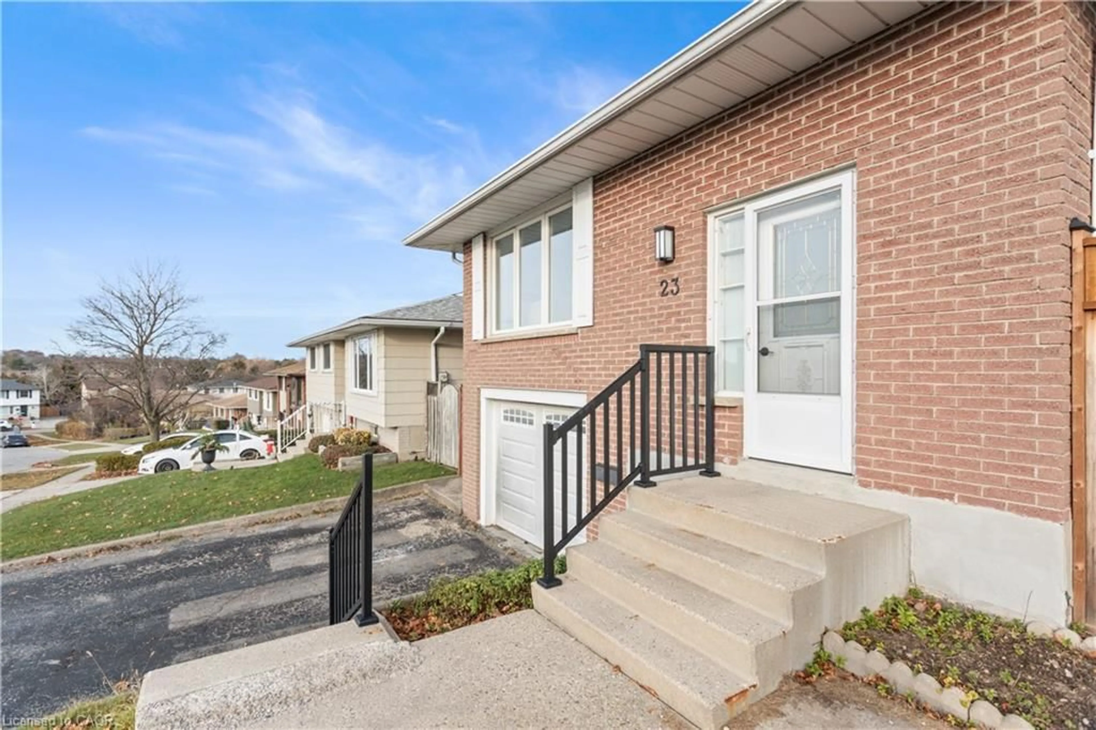 Home with brick exterior material, street for 23 Greenbrier Rd, Cambridge Ontario N1R 6M5