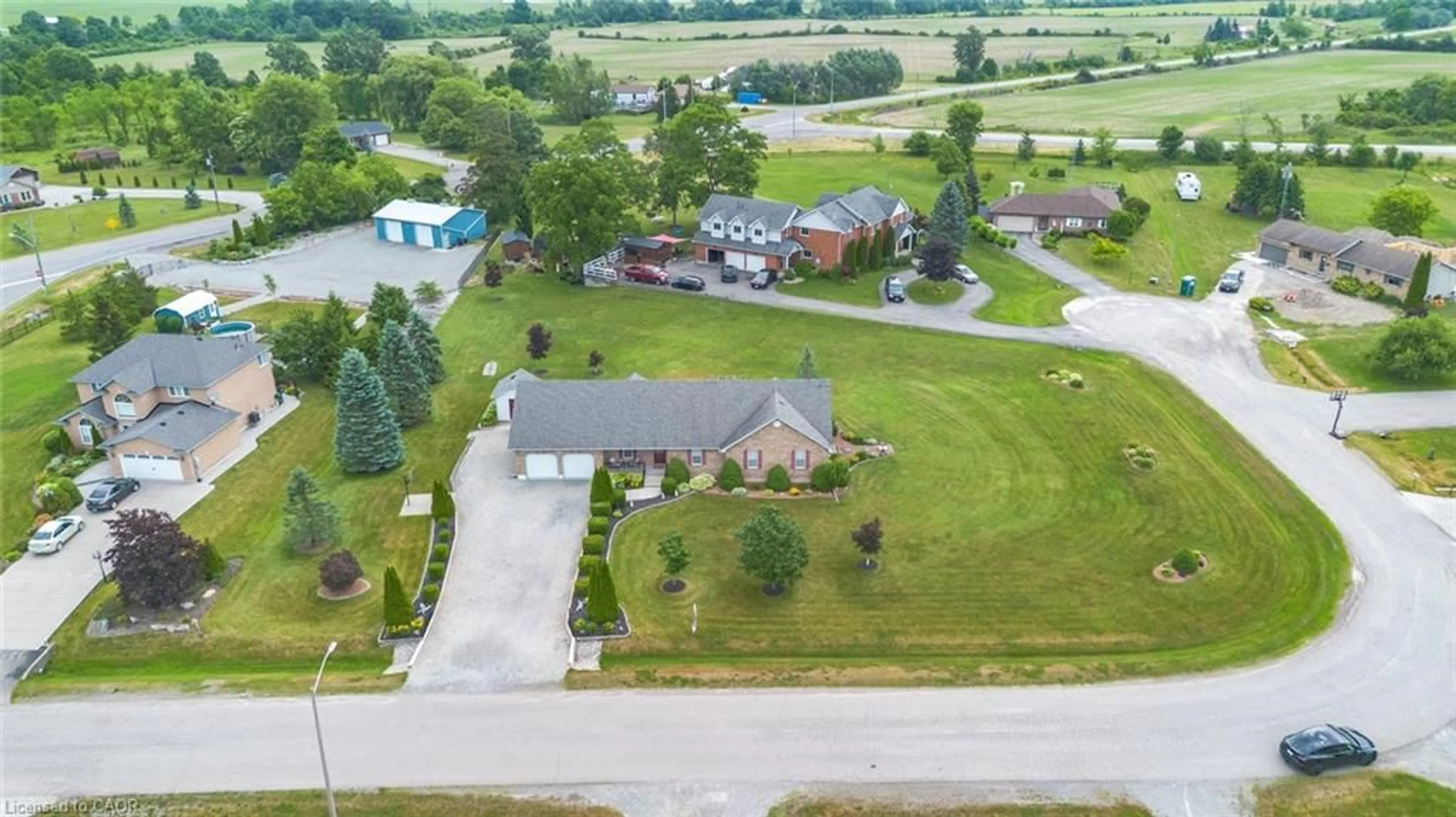 A pic from outside/outdoor area/front of a property/back of a property/a pic from drone, street for 703 Broman Crt, Caistorville Ontario N0A 1C0