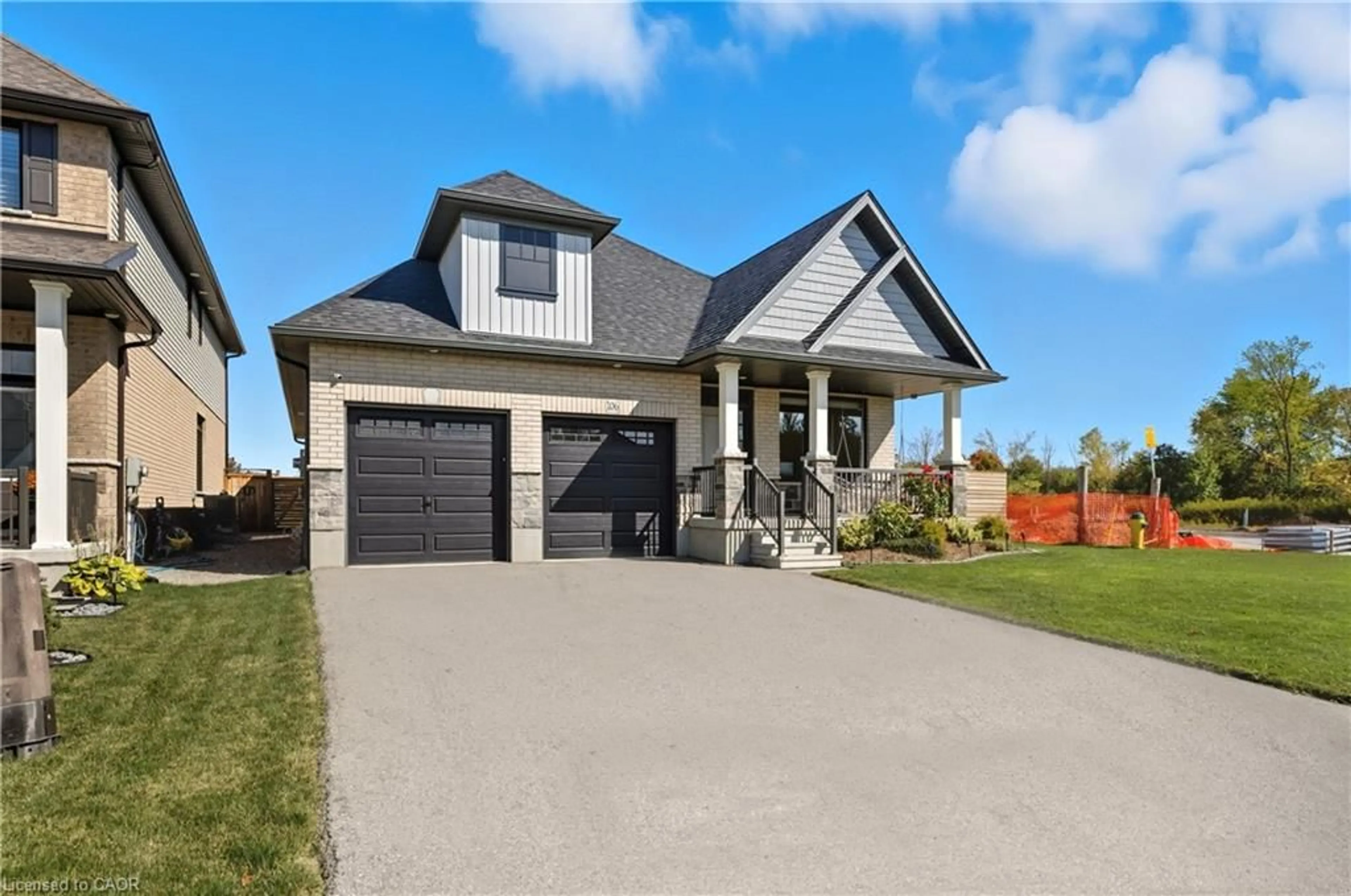 Home with brick exterior material, street for 106 Cutting Dr, Elora Ontario N0B 1S0