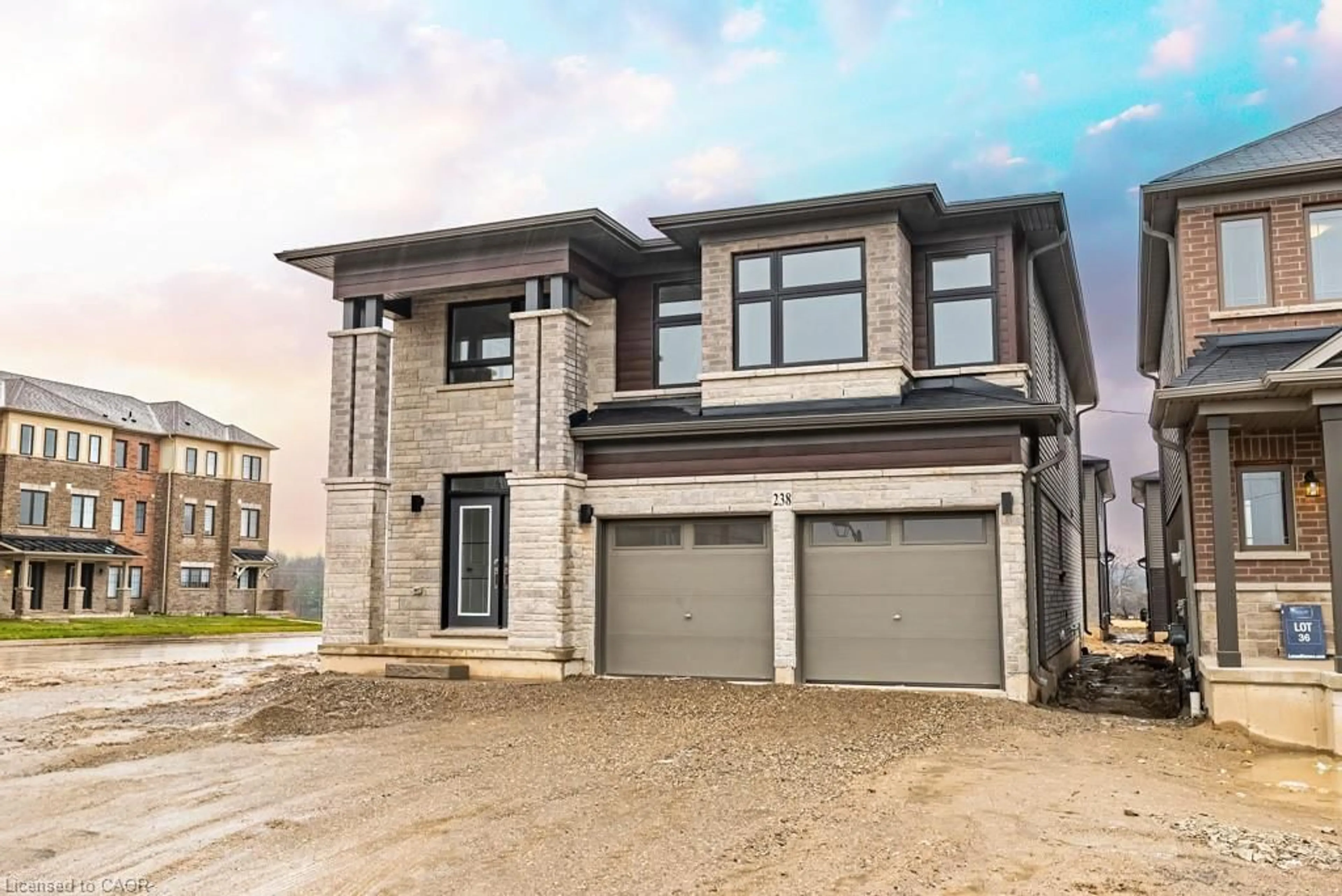 Home with brick exterior material, street for 238 Longboat Run, Brantford Ontario N3T 0X1