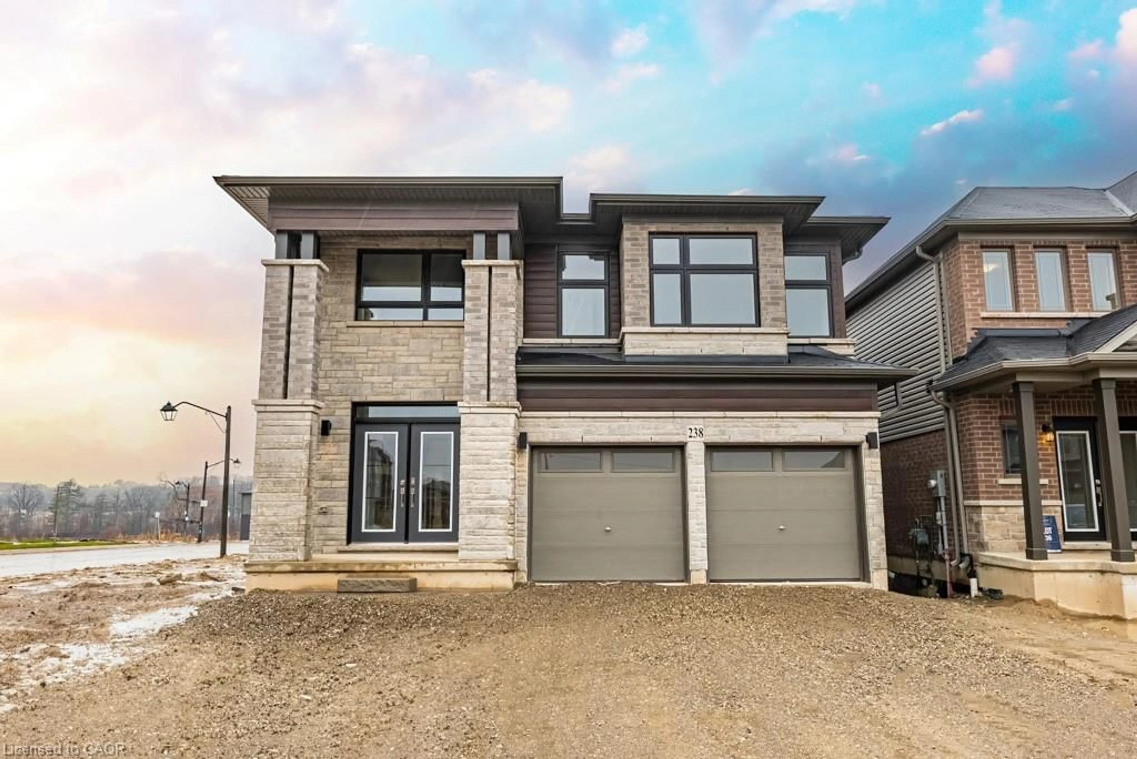 Home with brick exterior material, street for 238 Longboat Run, Brantford Ontario N3T 0X1