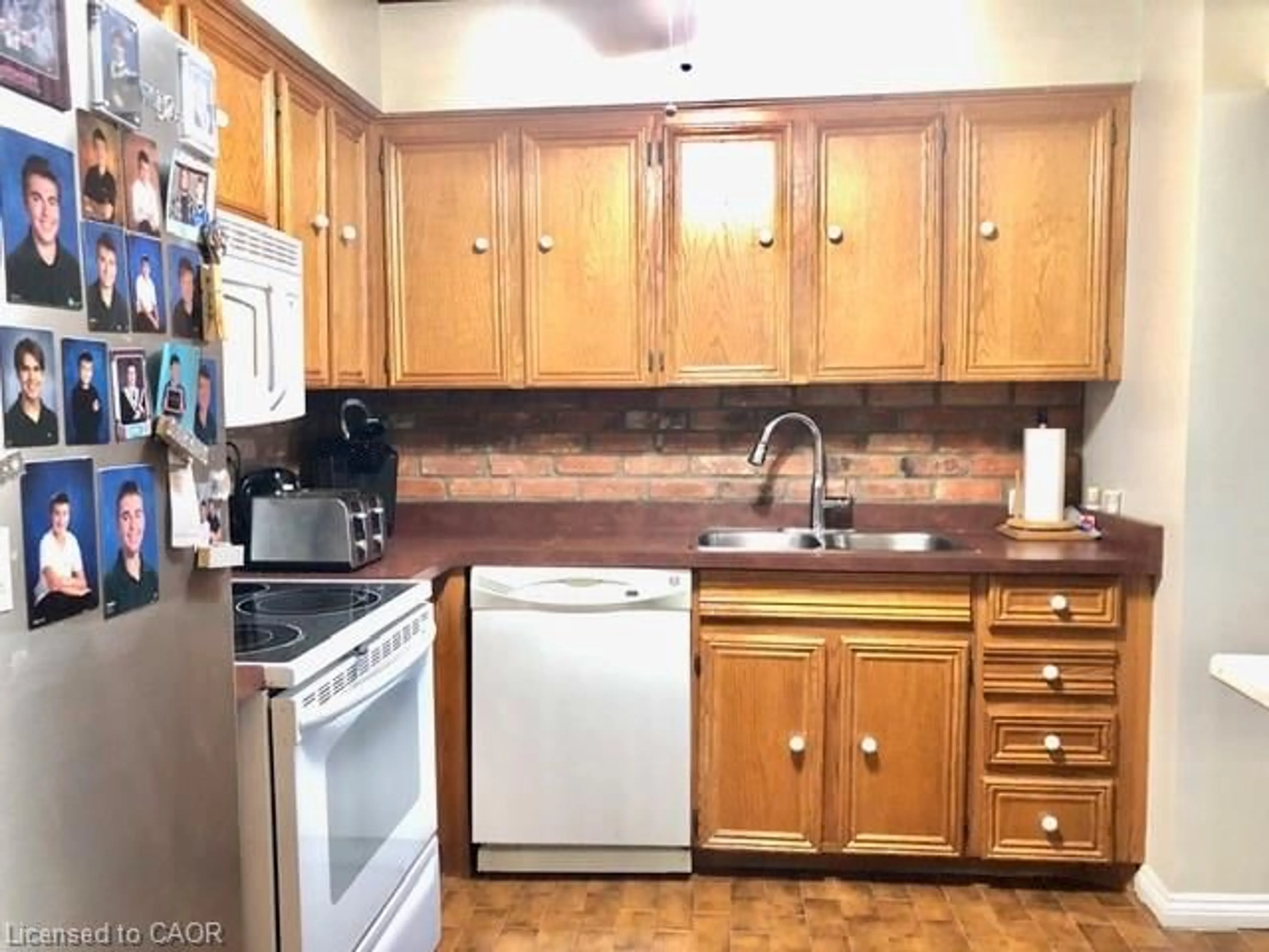 Standard kitchen, wood/laminate floor for 40 Harrisford St #103, Hamilton Ontario L8K 6N1