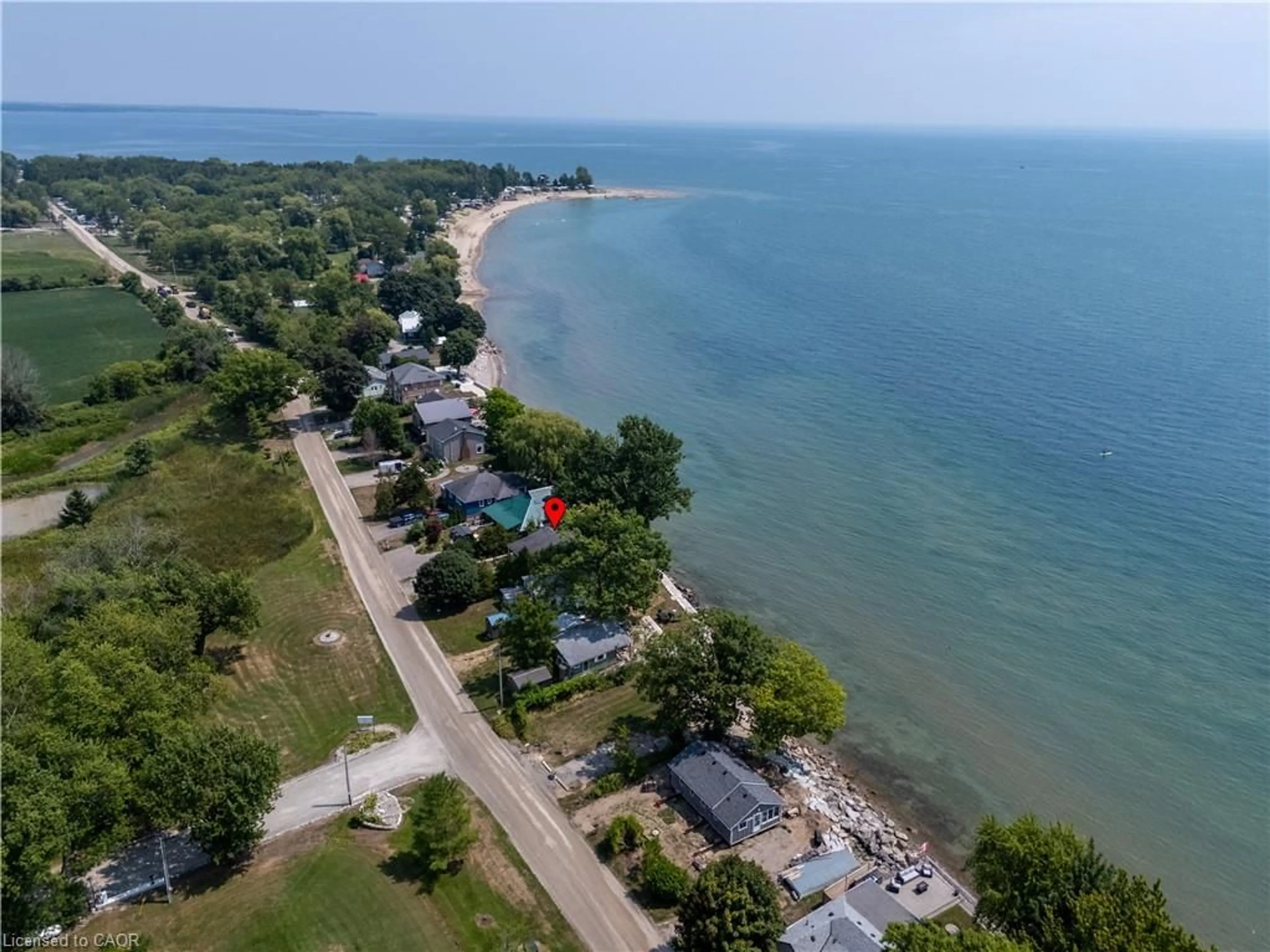 A pic from outside/outdoor area/front of a property/back of a property/a pic from drone, water/lake/river/ocean view for 2110 Lakeshore Rd, Dunnville Ontario N1A 2W8