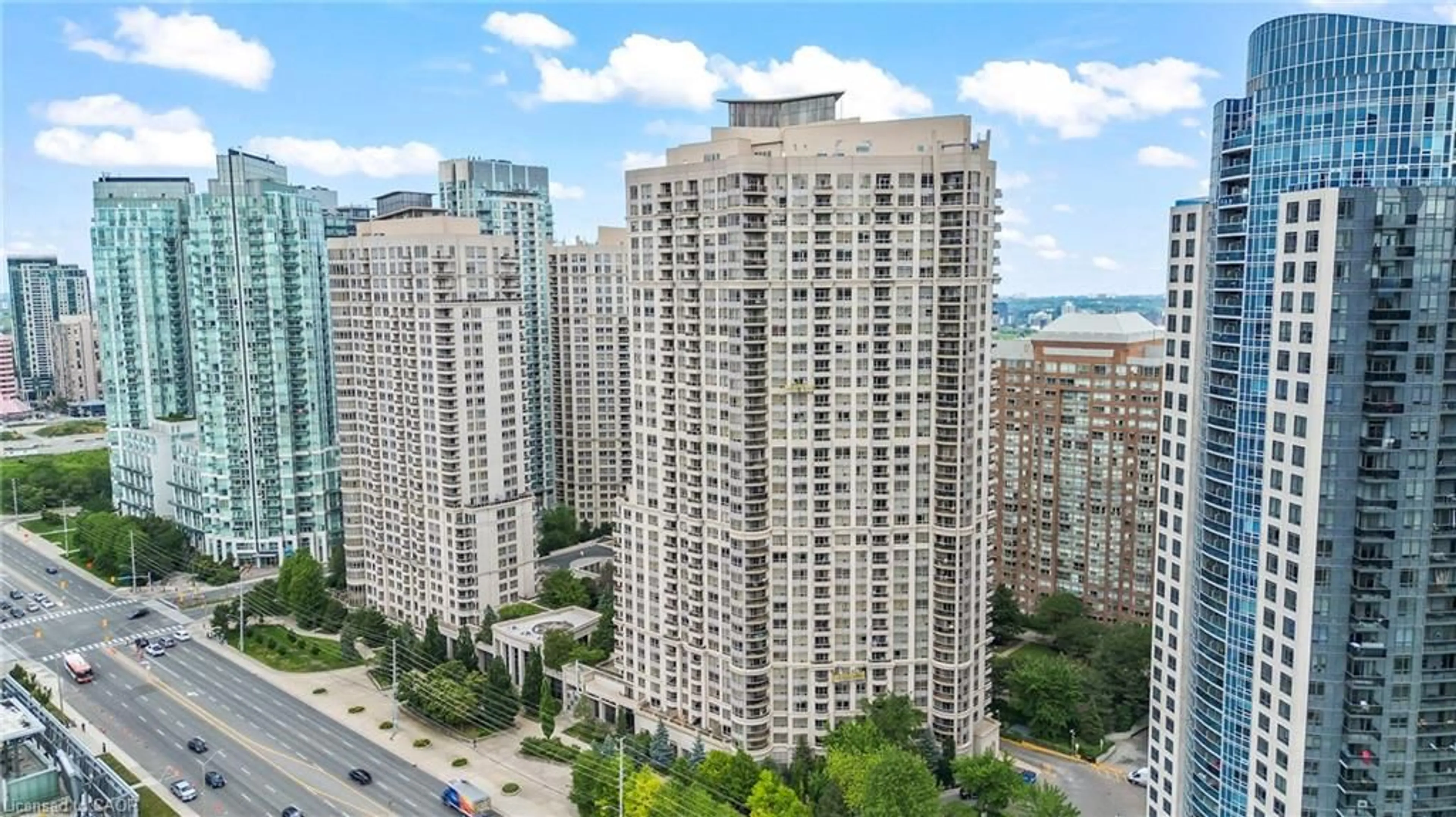 A pic from outside/outdoor area/front of a property/back of a property/a pic from drone, city buildings view from balcony for 310 Burnhamthorpe Rd #401, Mississauga Ontario L5B 4P9