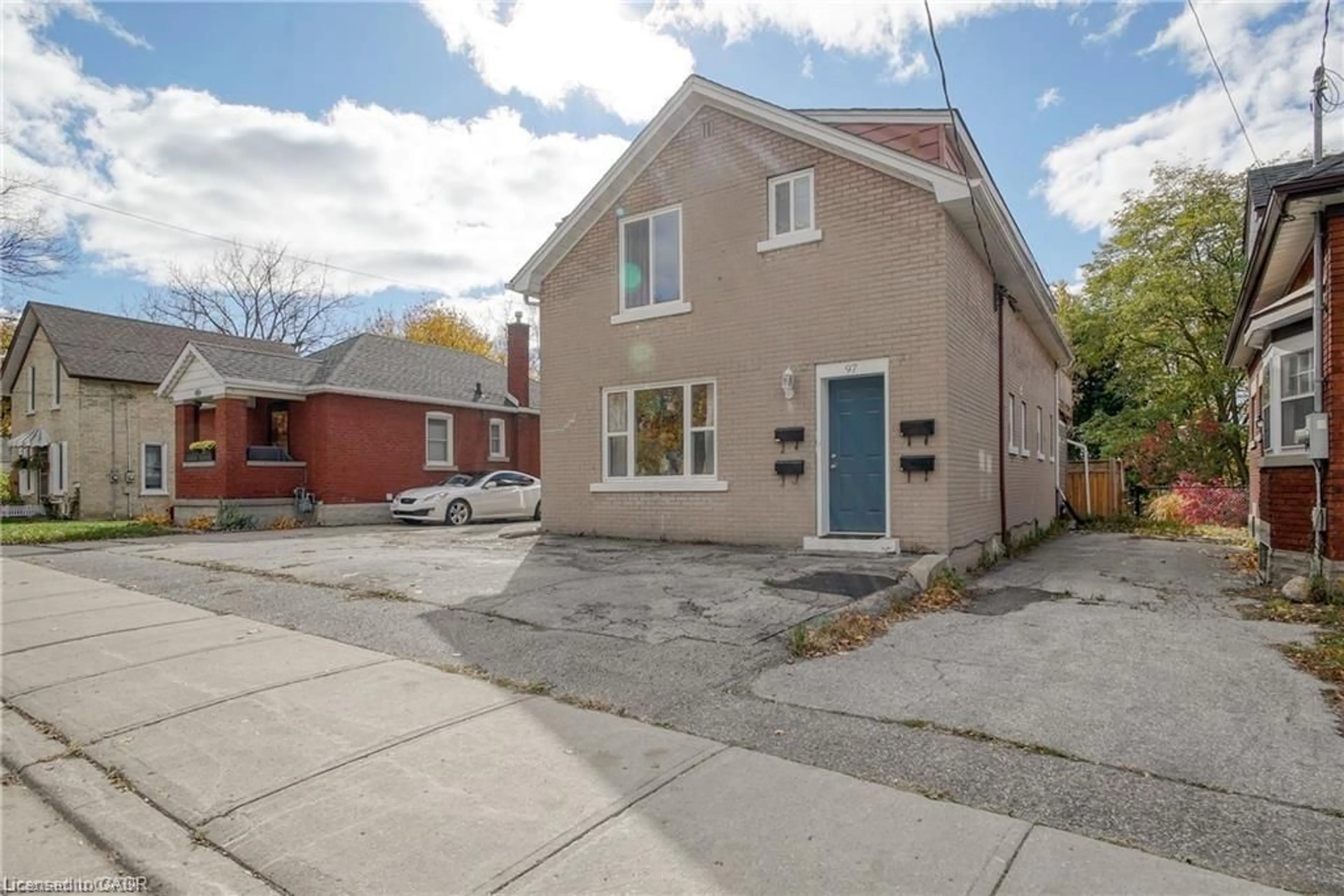 A pic from outside/outdoor area/front of a property/back of a property/a pic from drone, street for 97 St George St, Kitchener Ontario N2G 2T2