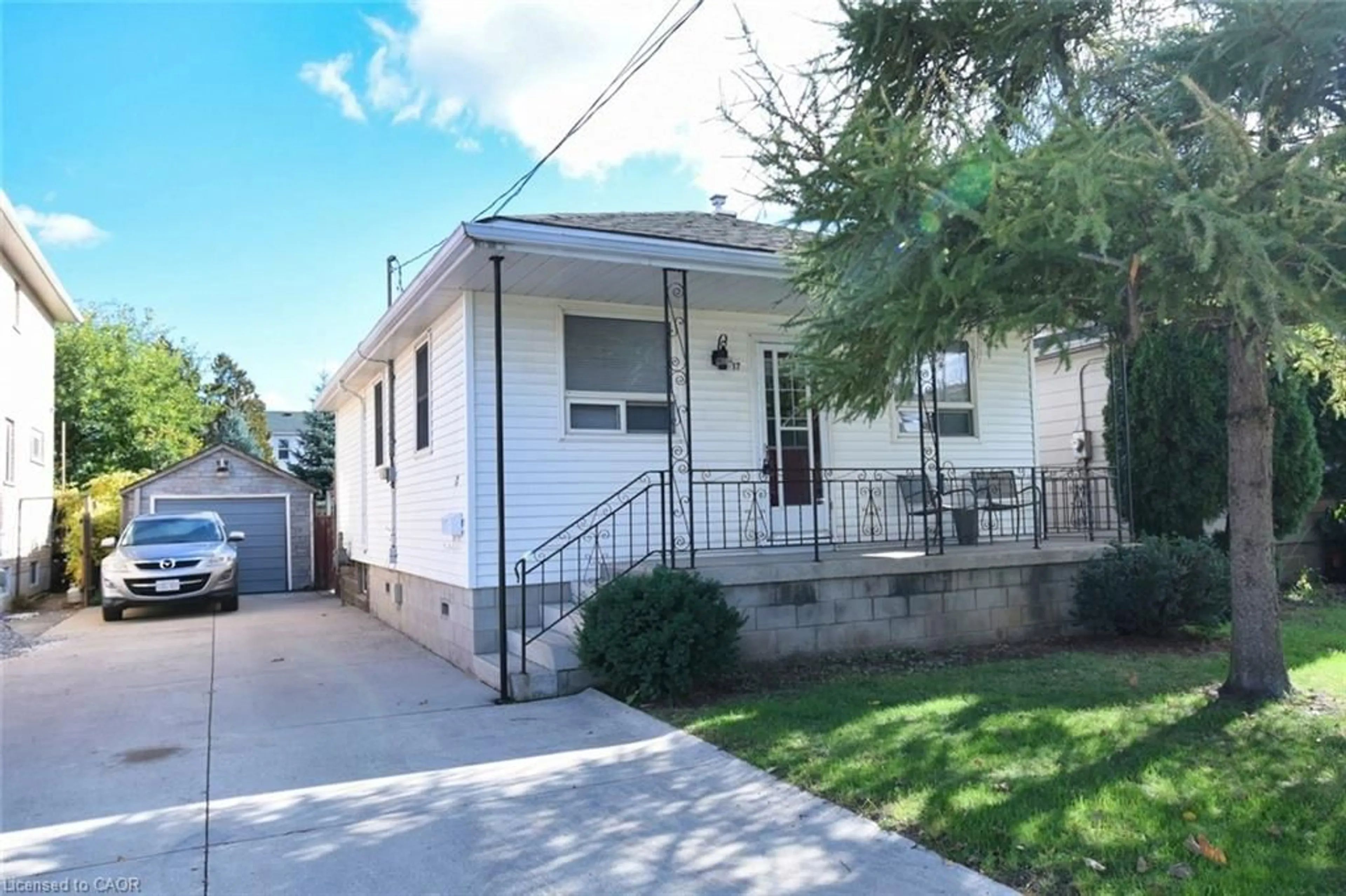 Home with vinyl exterior material, street for 17 Craigroyston Rd, Hamilton Ontario L8H 1A2