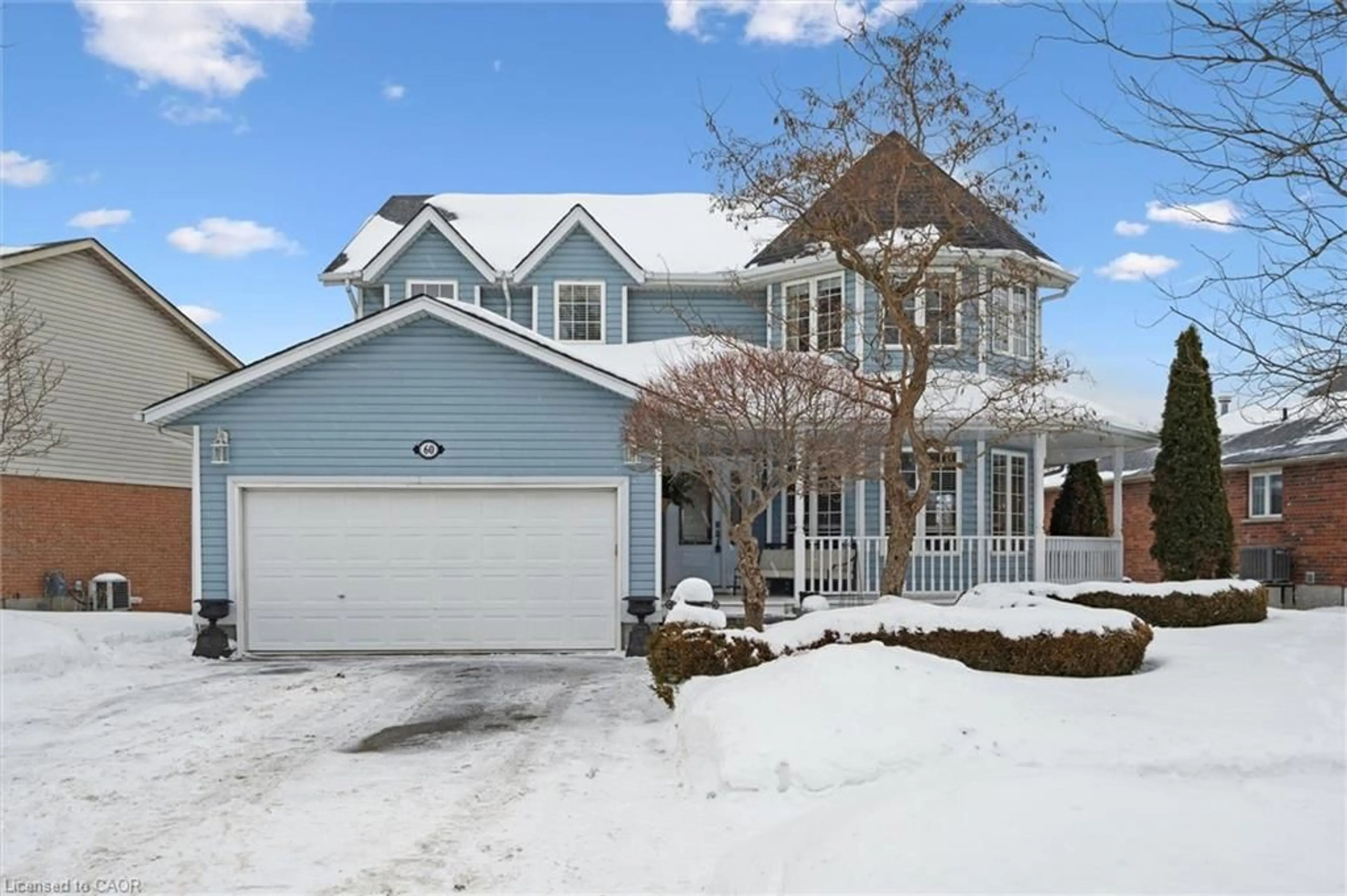 Home with vinyl exterior material, street for 60 Hazelwood Dr, Guelph Ontario N1C 1A9