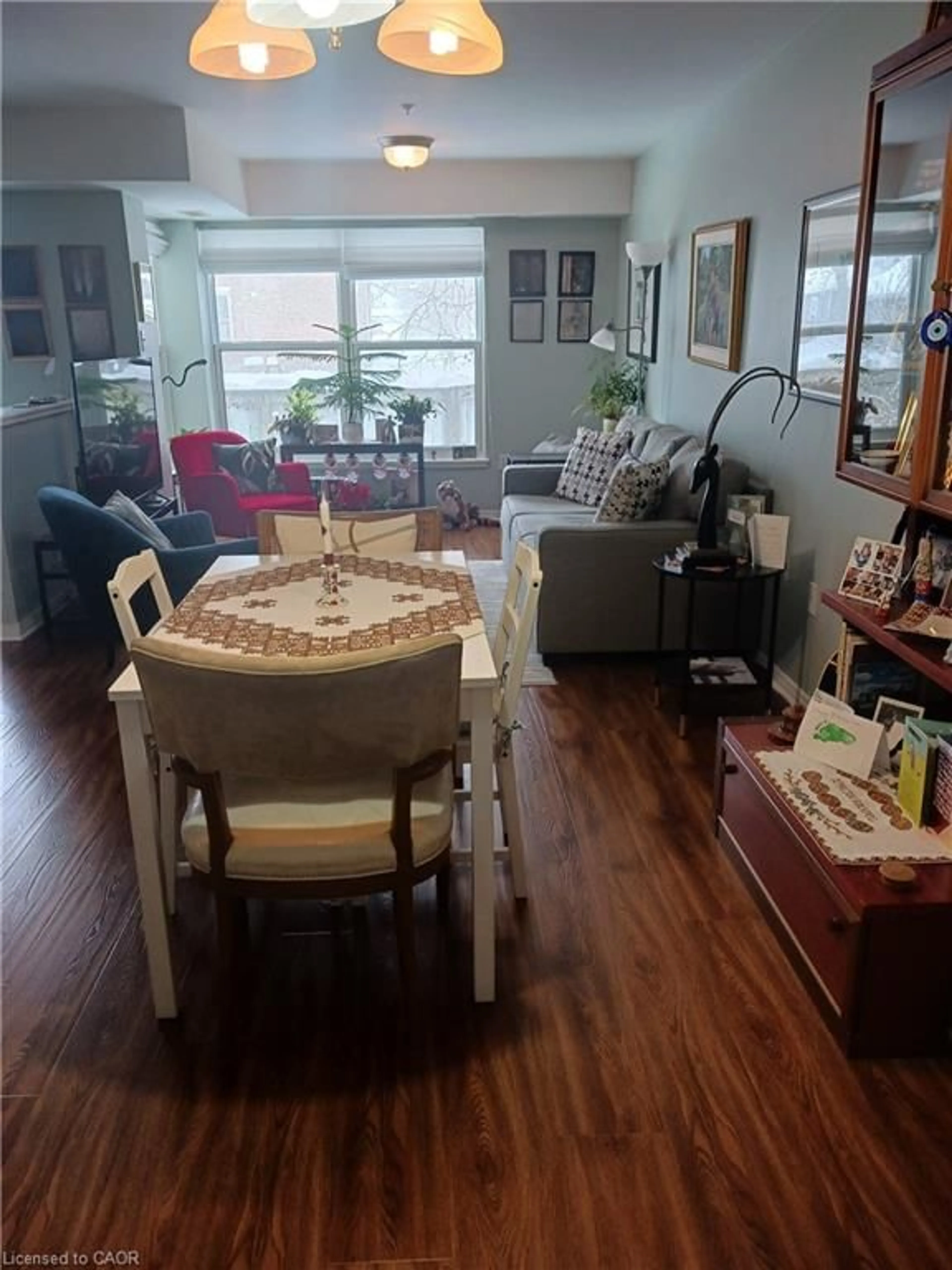 Living room with furniture, wood/laminate floor for 8 Huron St #108, Lindsay Ontario K9V 6K3