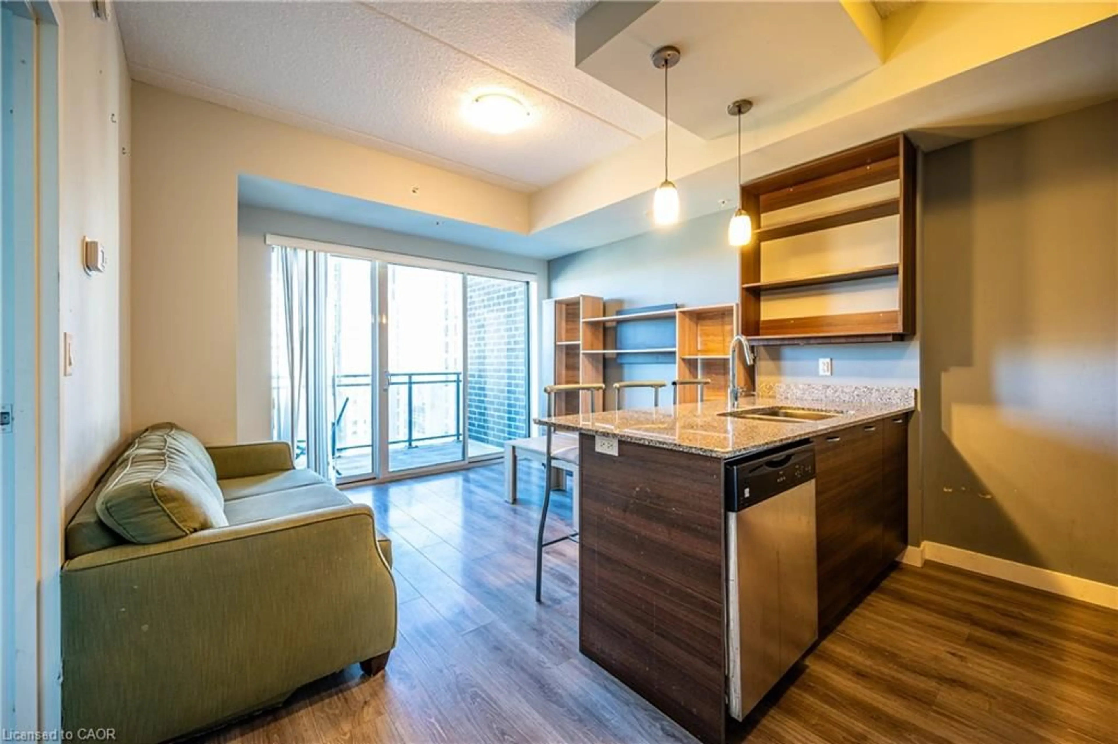 Open concept kitchen, wood/laminate floor for 318 Spruce St #1106, Waterloo Ontario N2L 3M7