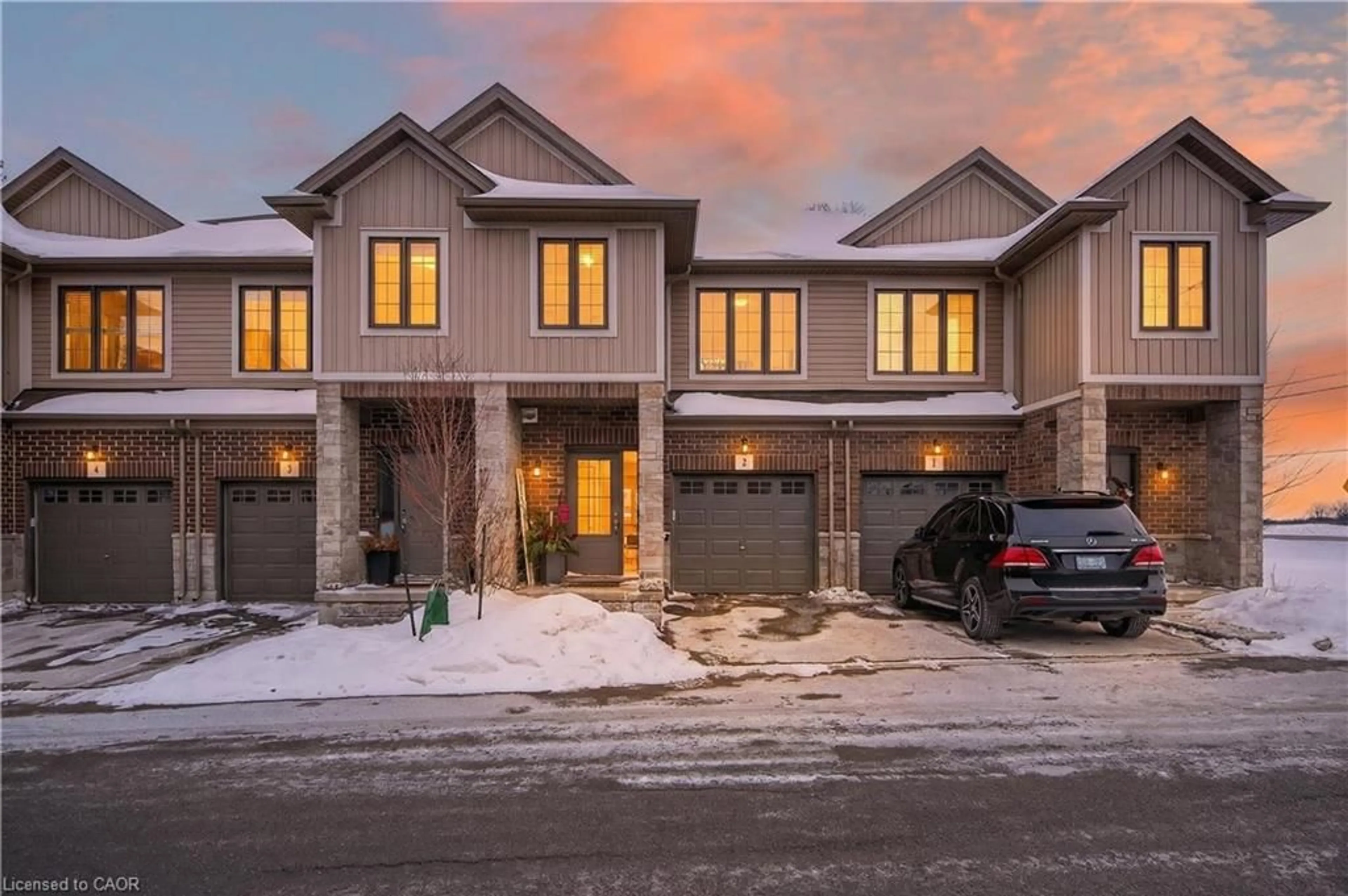 Home with brick exterior material, street for 377 Glancaster Rd #2, Ancaster Ontario L9G 0G4