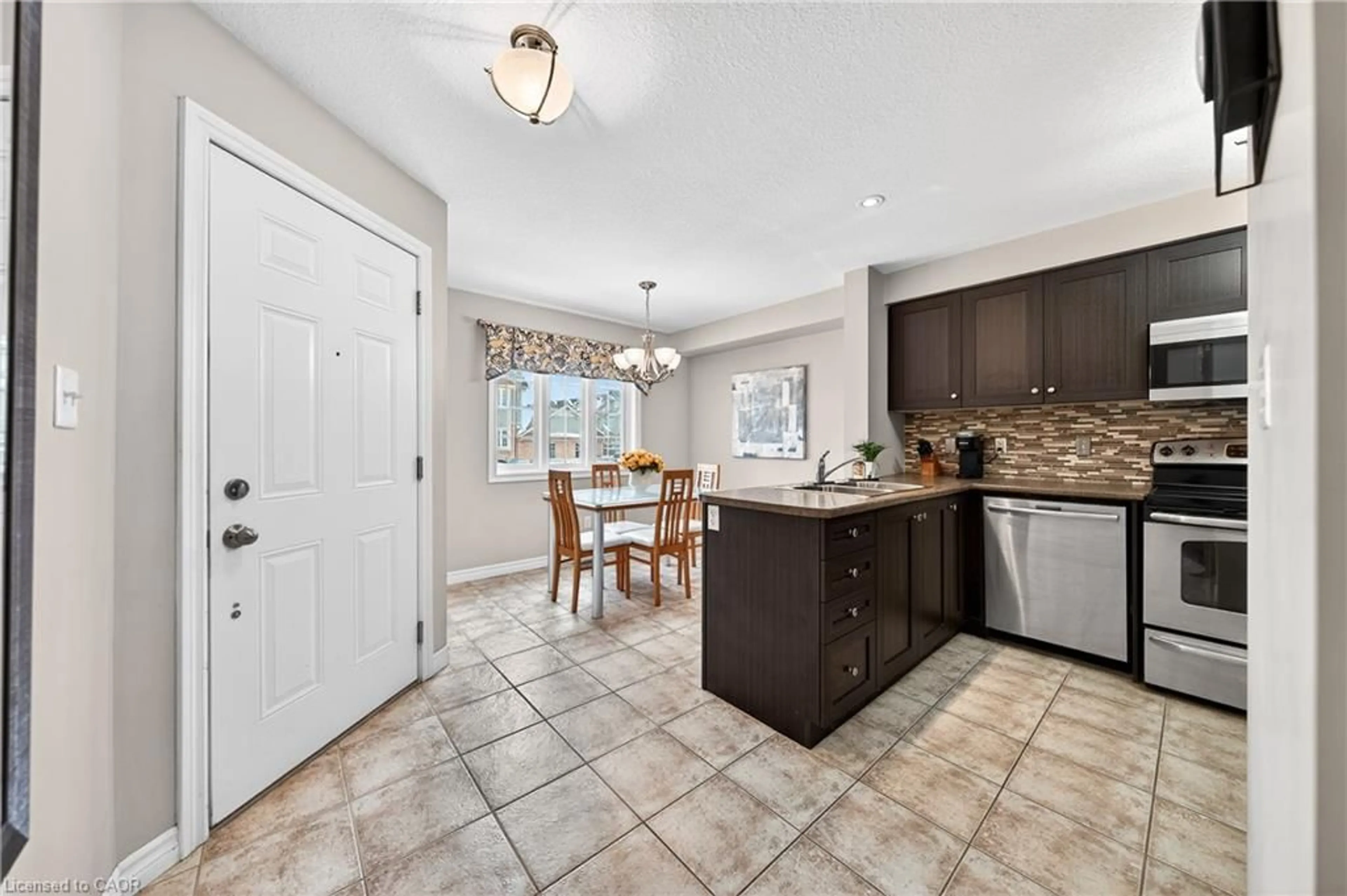 Open concept kitchen, ceramic/tile floor for 15 Carere Cres #35A, Guelph Ontario N1E 0K4