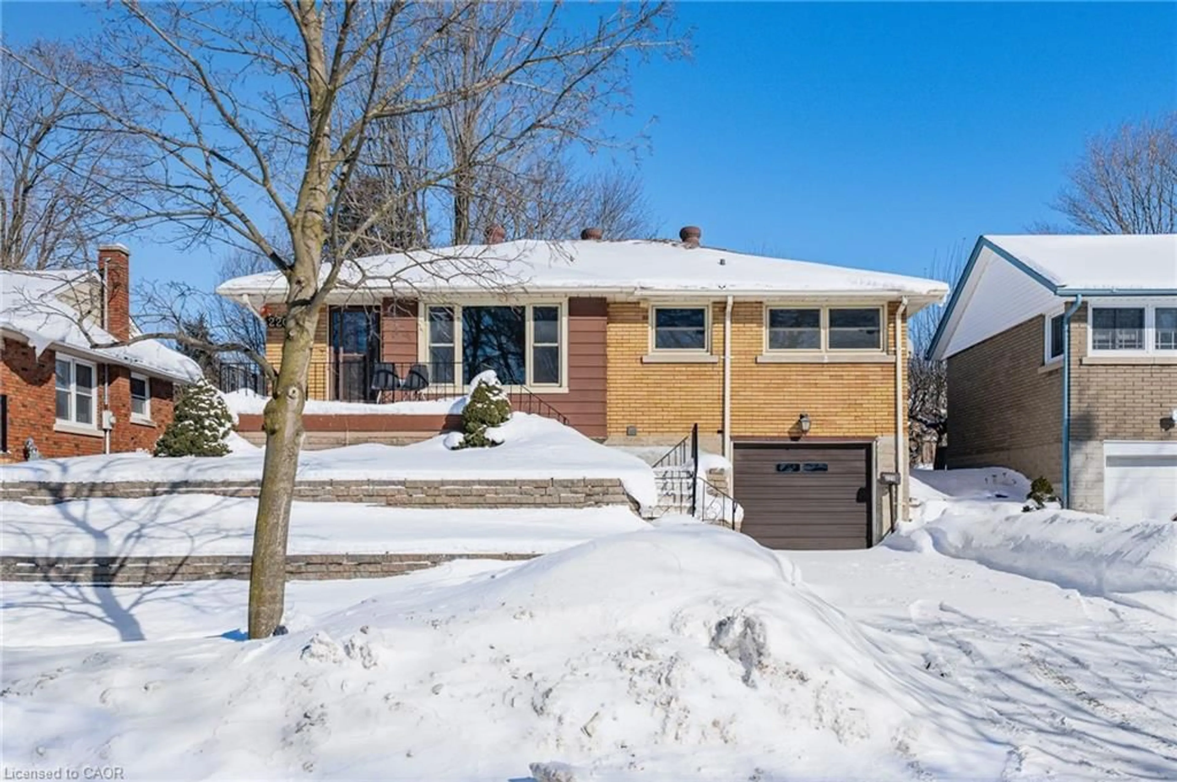 Home with brick exterior material, street for 220 Clark Ave, Kitchener Ontario N2C 1Y5