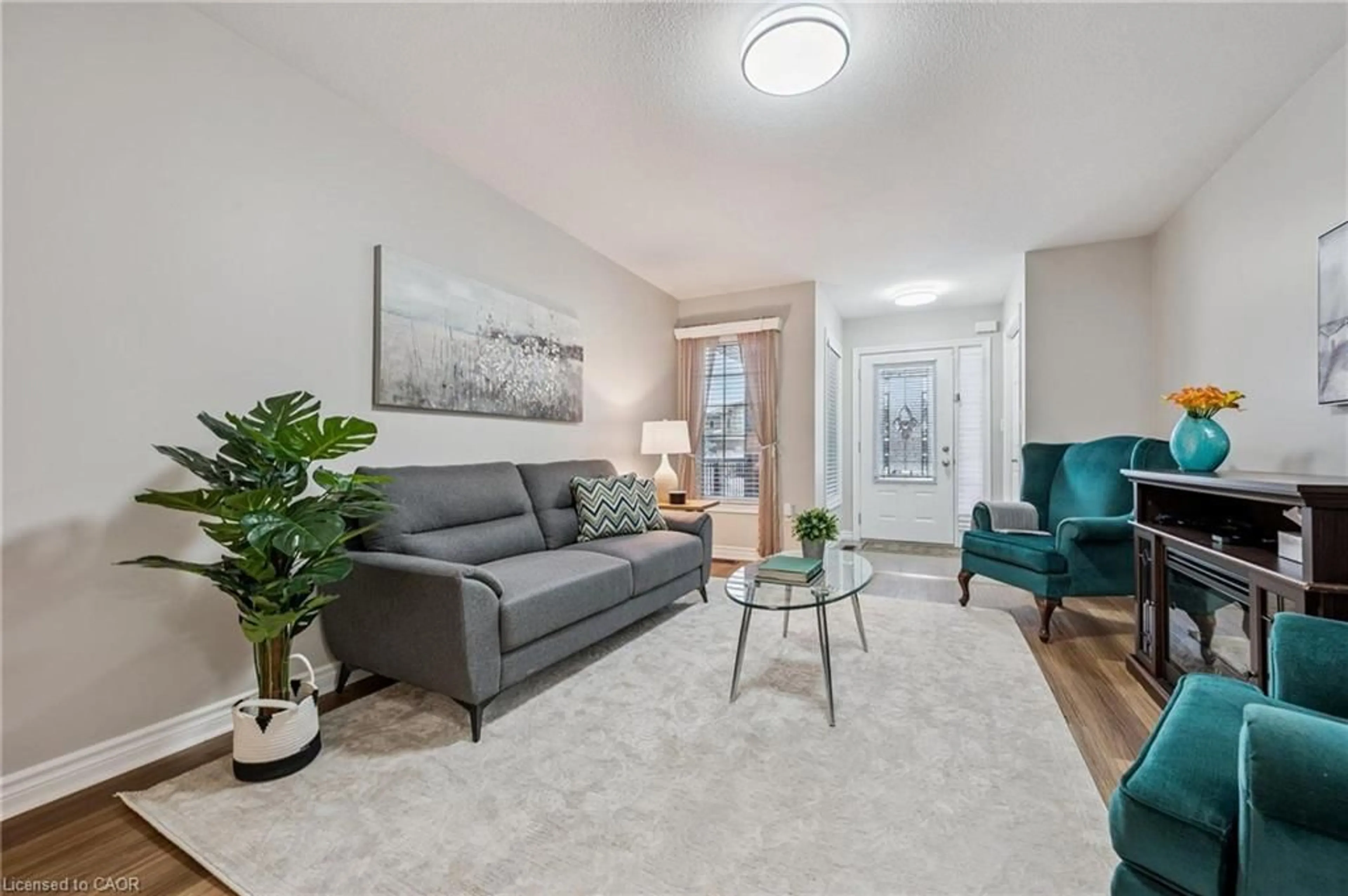 Living room with furniture, unknown for 21 Wideman Blvd, Guelph Ontario N1E 0J2