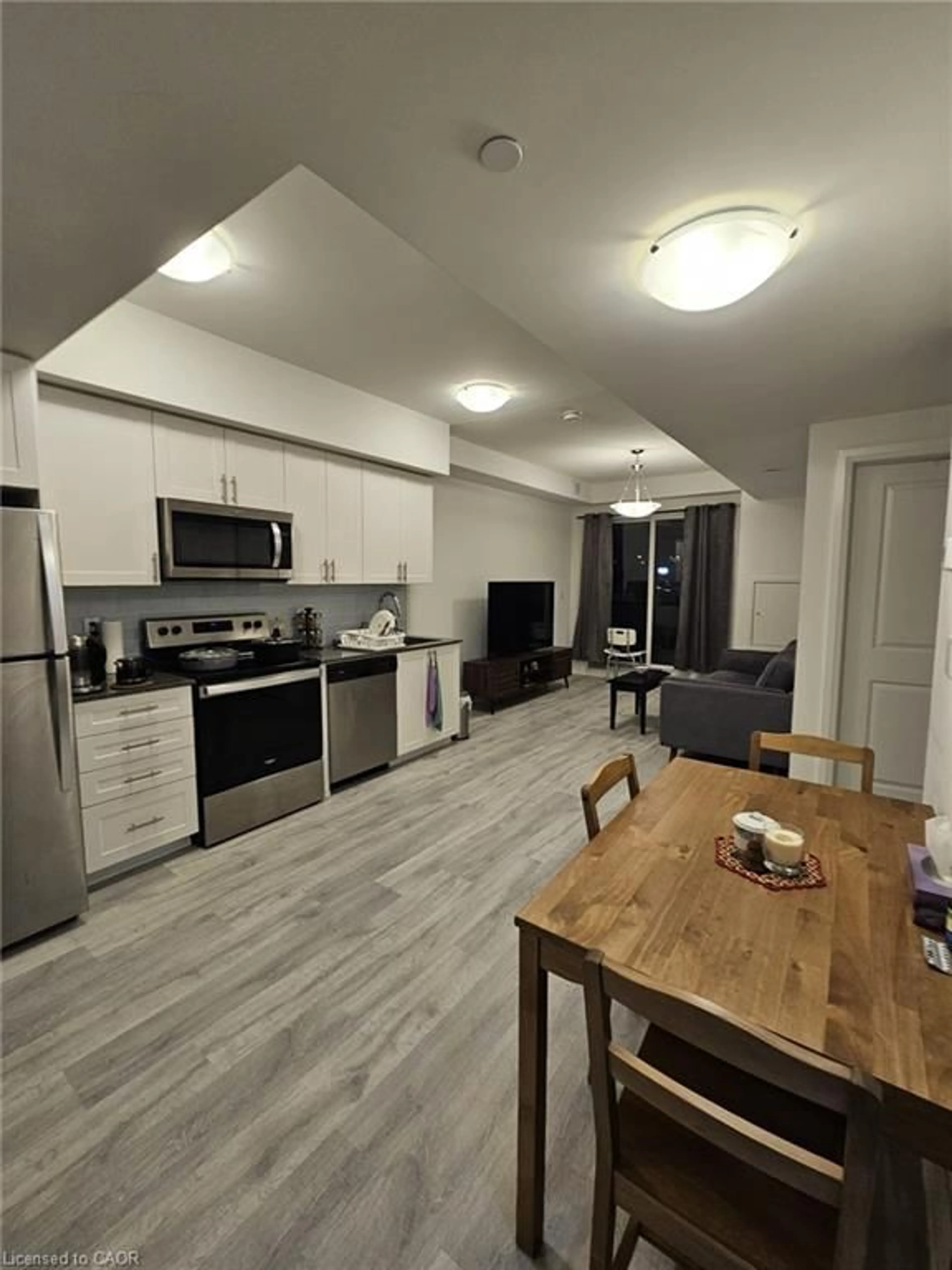 Open concept kitchen, wood/laminate floor for 9700 Ninth Line #216, Markham Ontario L6B 1R7