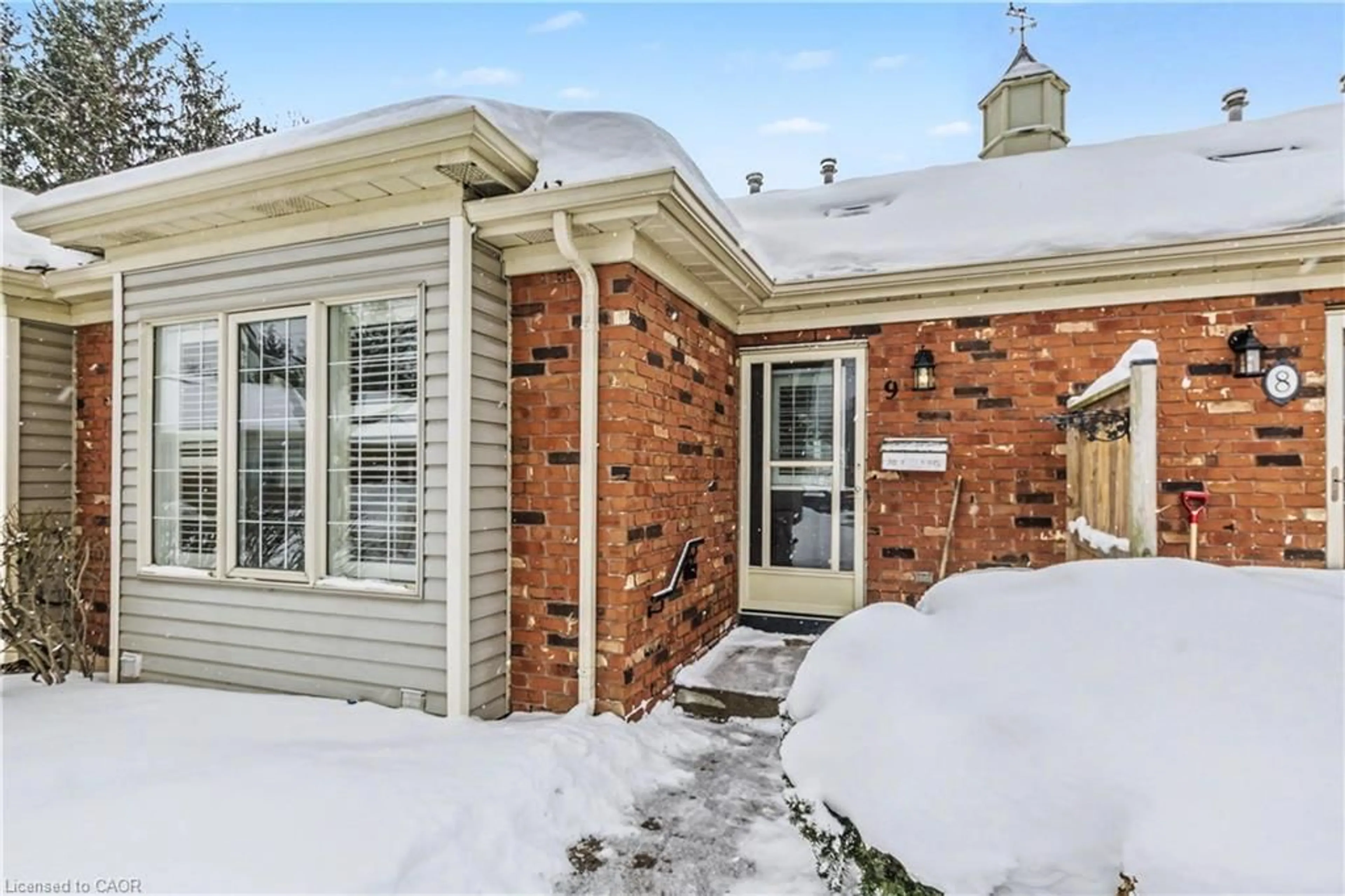Home with brick exterior material, street for 175 Fiddlers Green Rd #9, Hamilton Ontario L9G 4X7