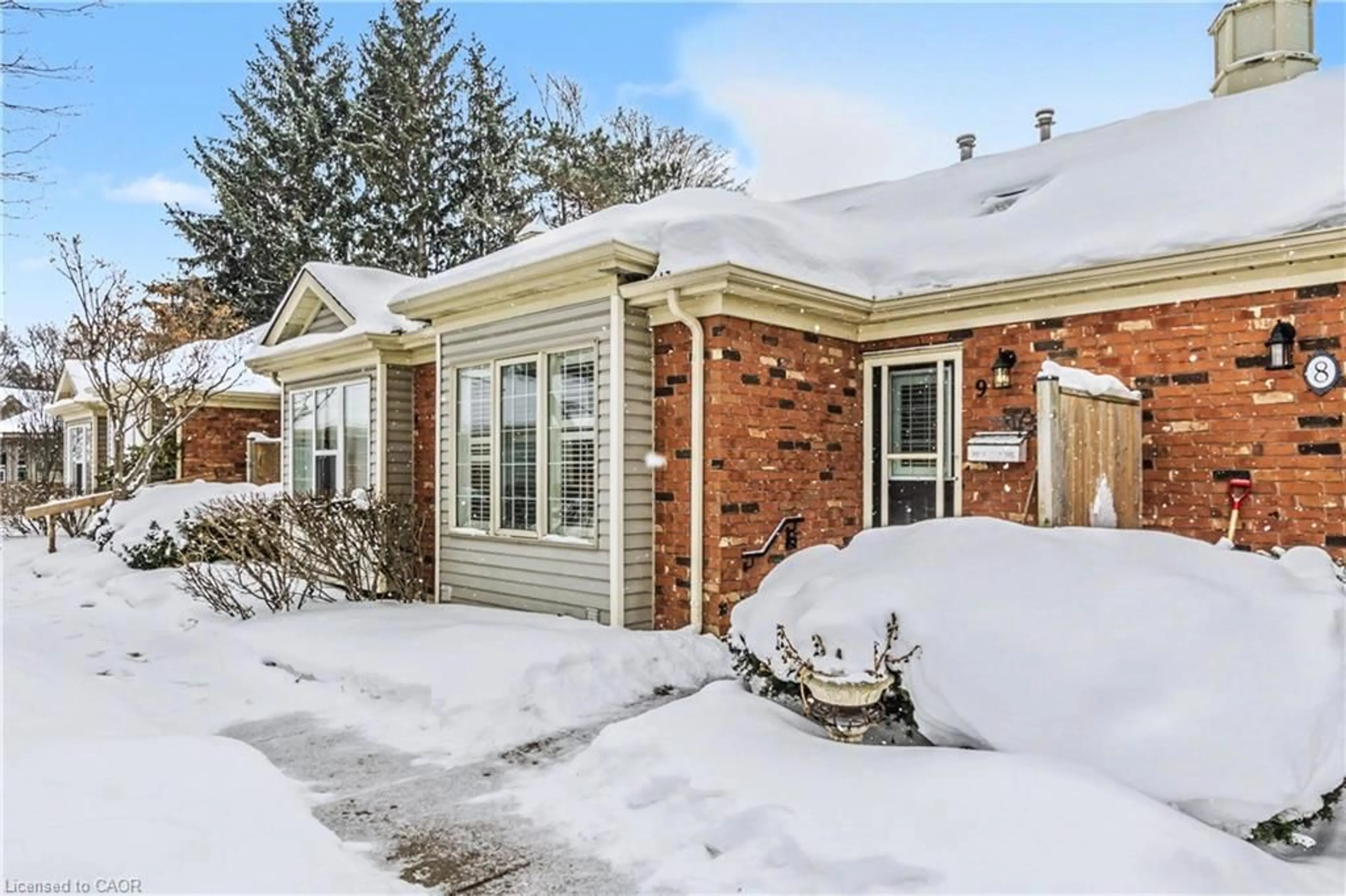 Home with brick exterior material, street for 175 Fiddlers Green Rd #9, Hamilton Ontario L9G 4X7