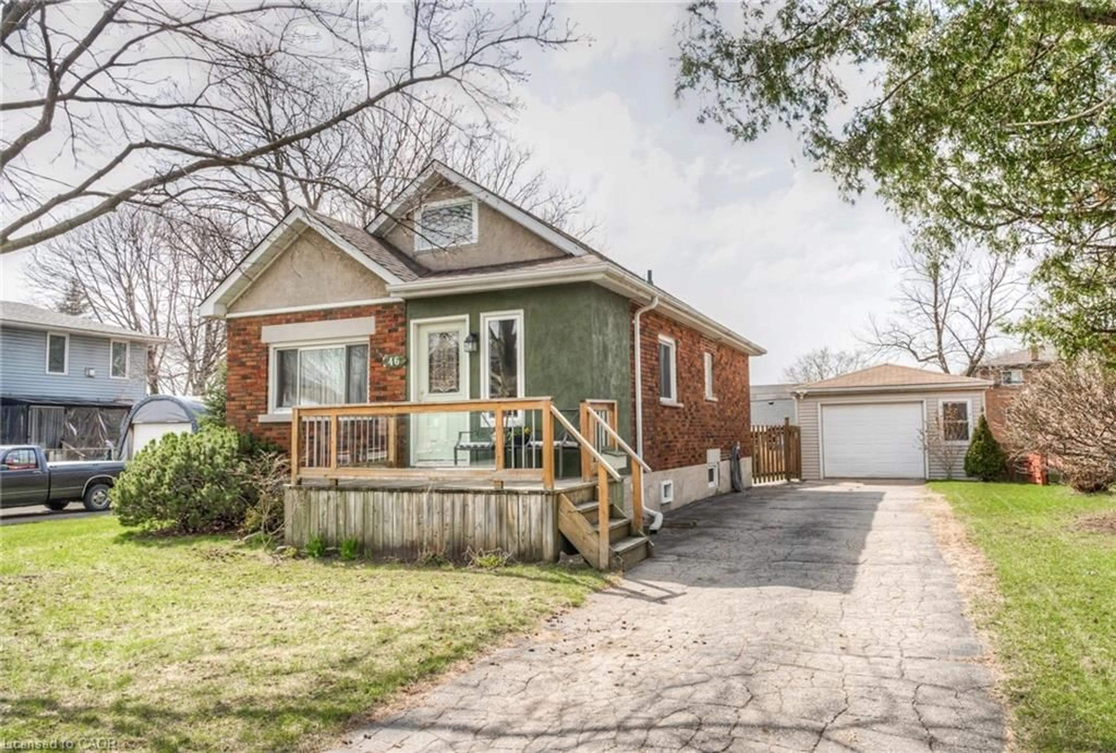 Home with brick exterior material, street for 46 2 Ave, Kitchener Ontario N2C 1N5