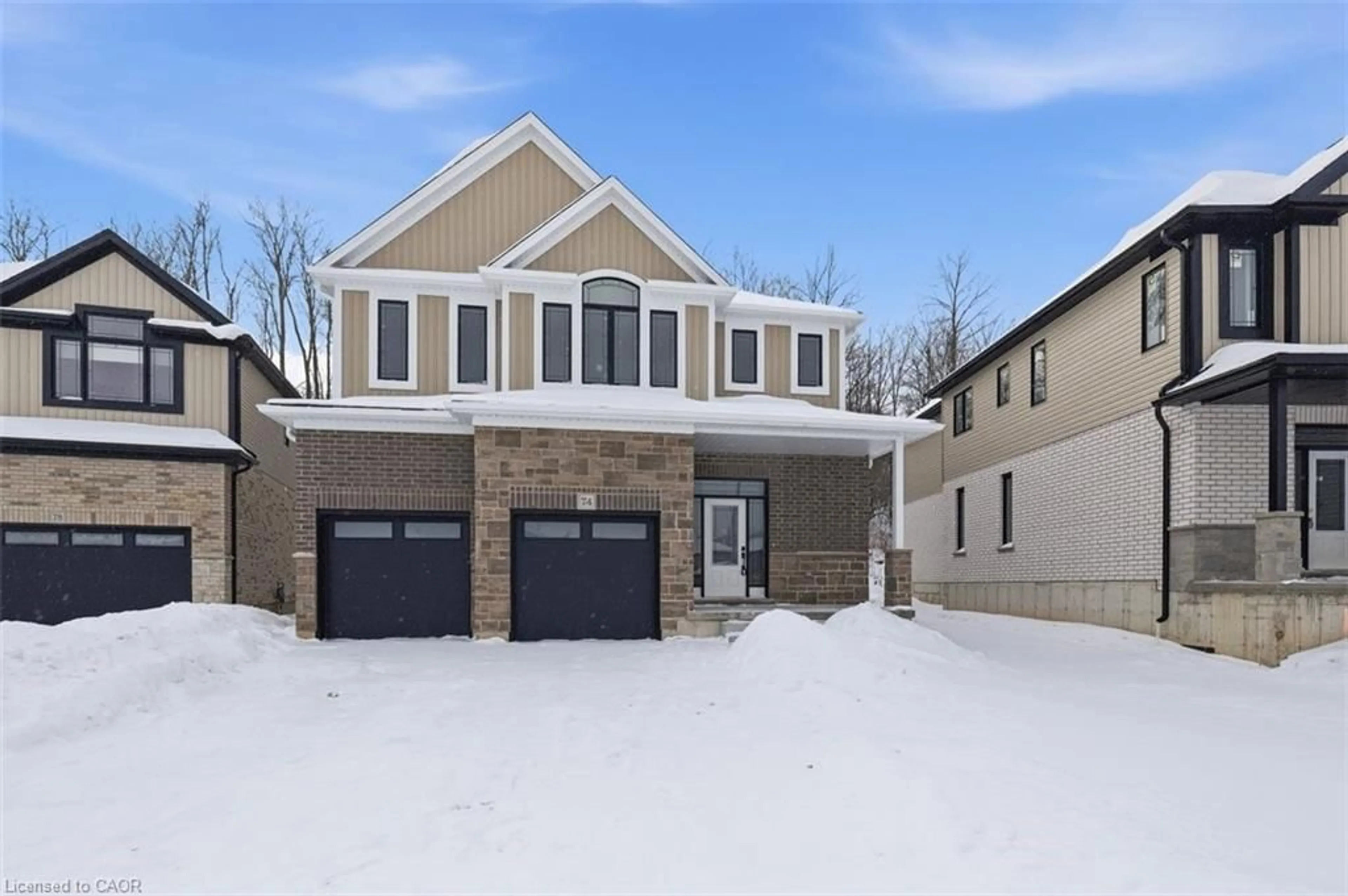 Home with brick exterior material, street for 74 Quarry Park Dr, Kitchener Ontario N2B 3J7